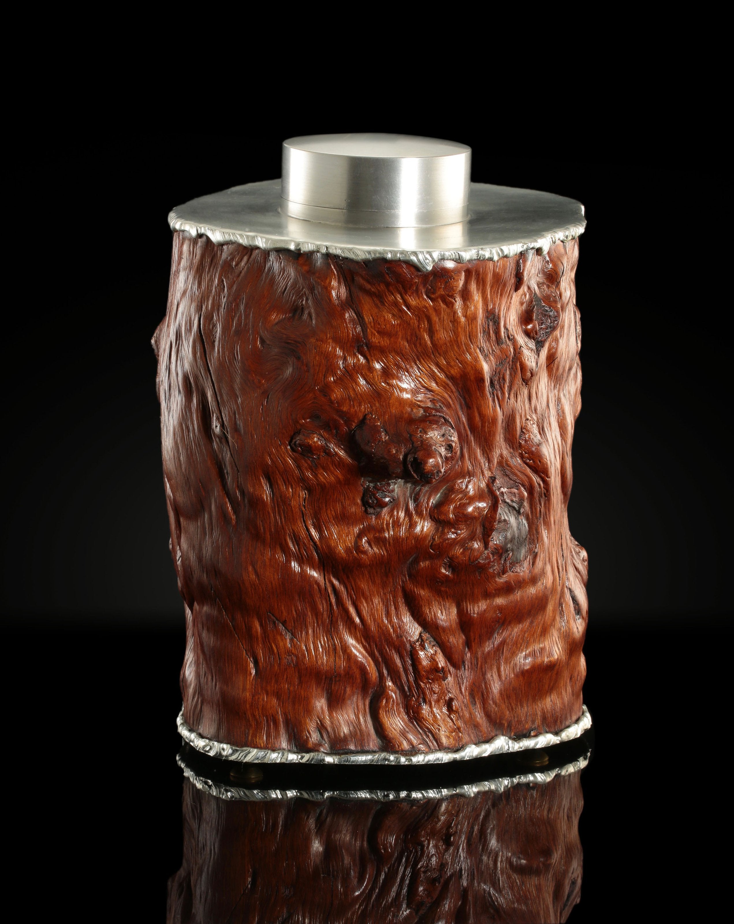 Tough and sturdy tin-carved burl wood tea caddy