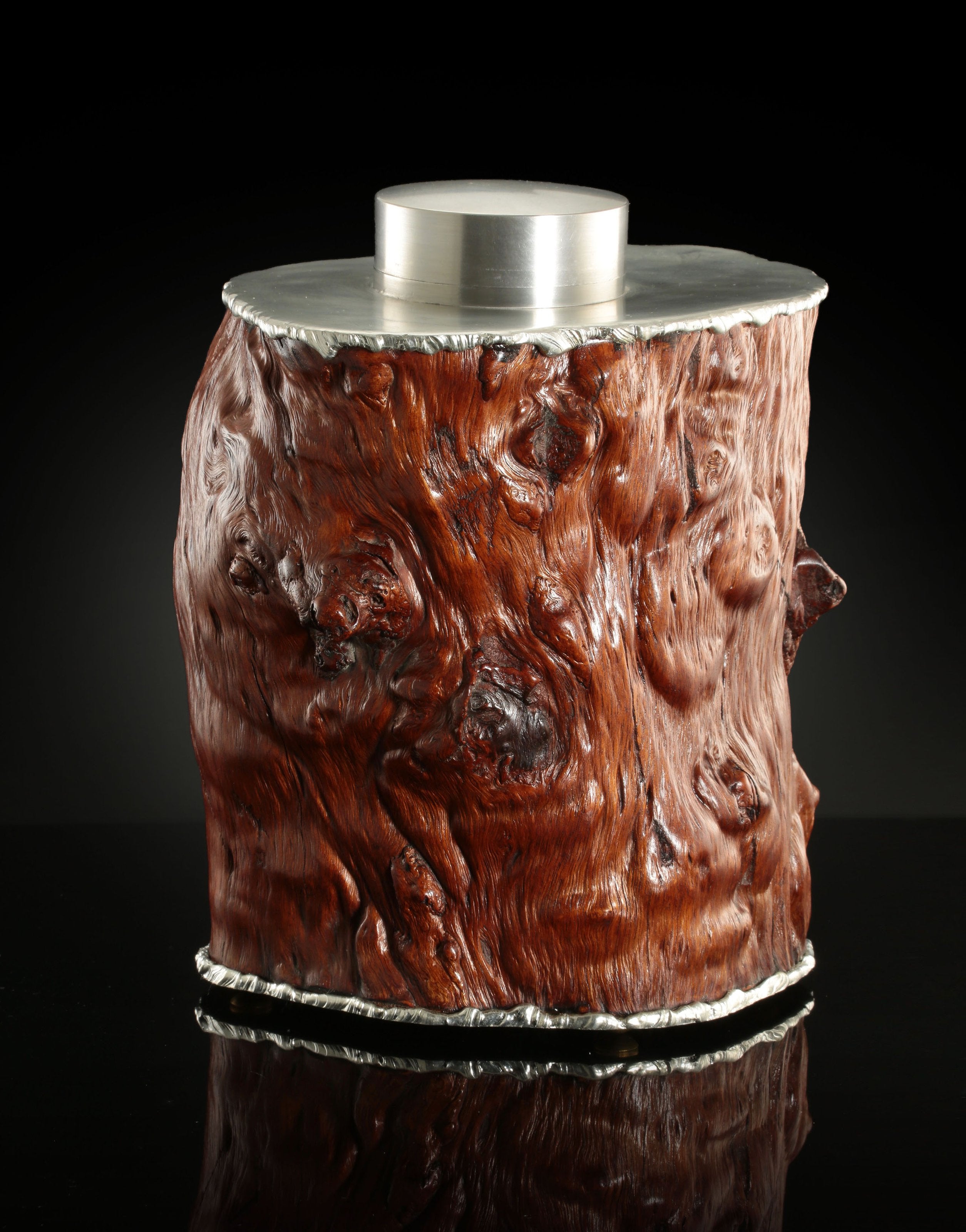 Tough and sturdy tin-carved burl wood tea caddy