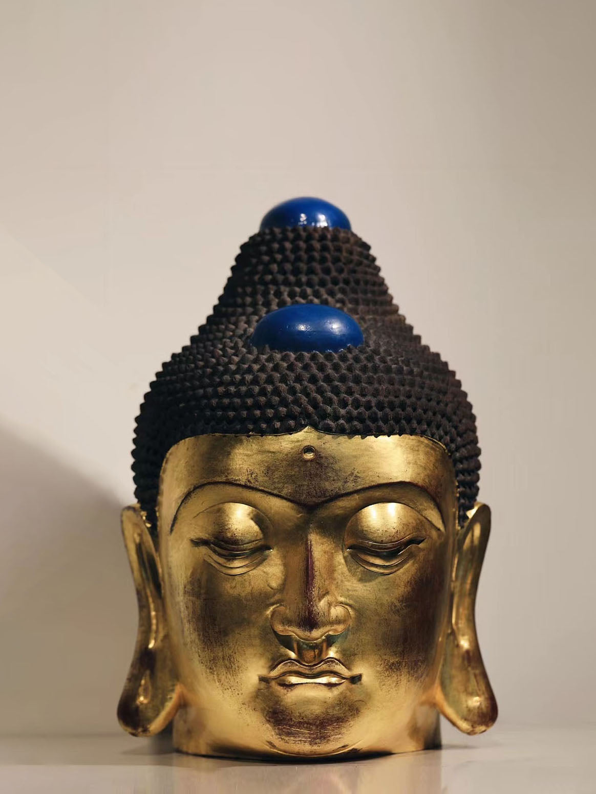 Ebony and Gold Leaf Buddha Head