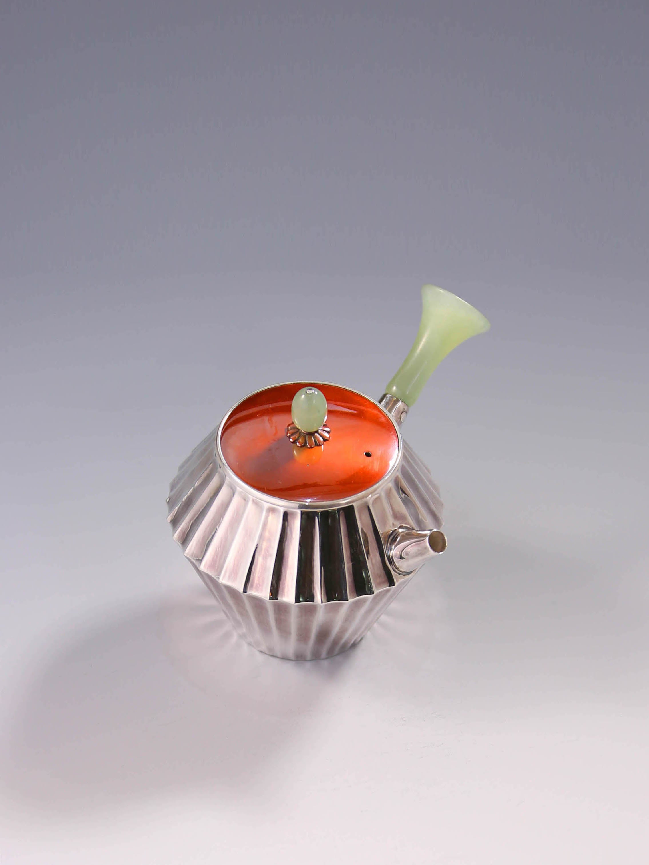 Ribbed Jade Button with Urgent Needle