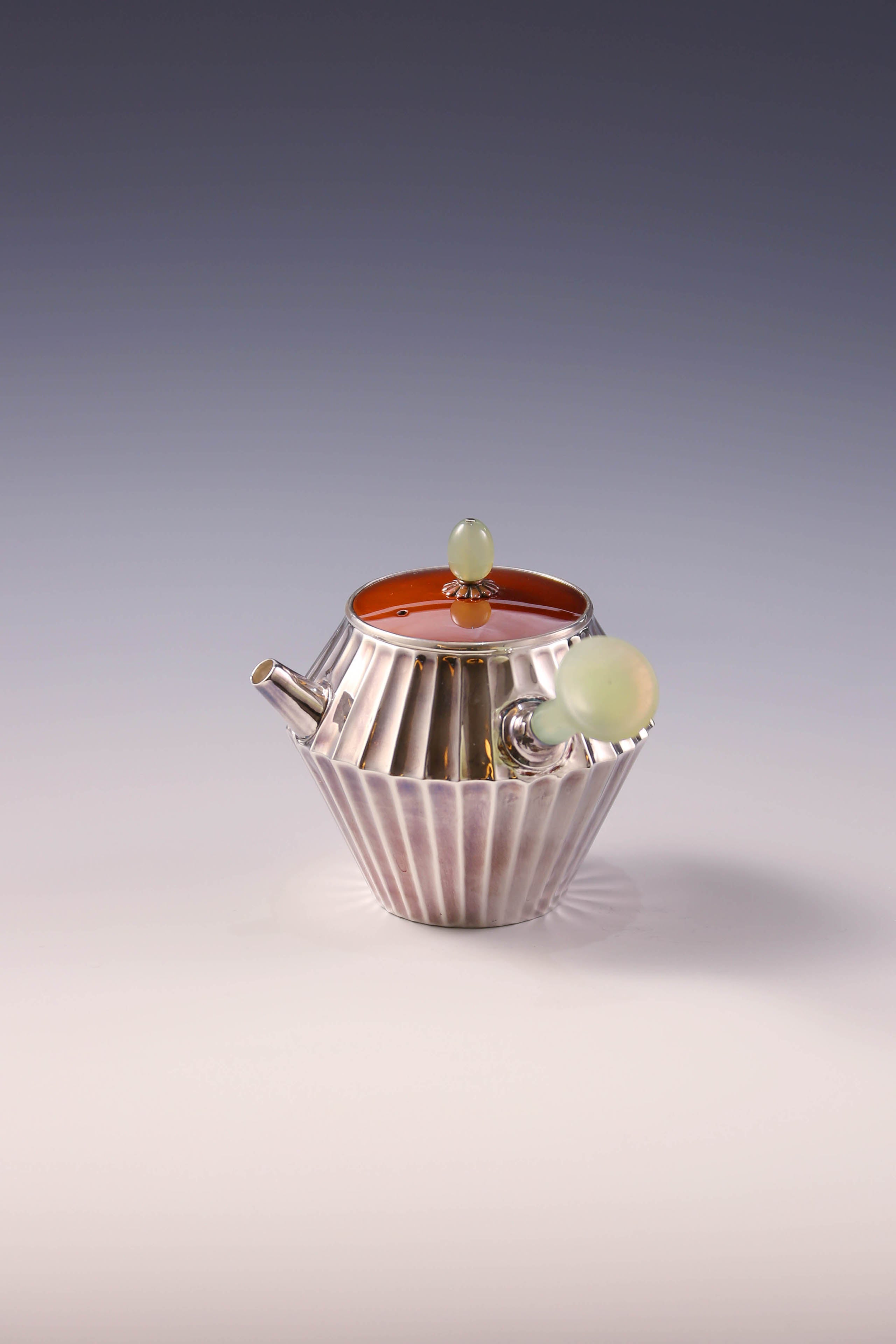 Ribbed Jade Button with Urgent Needle