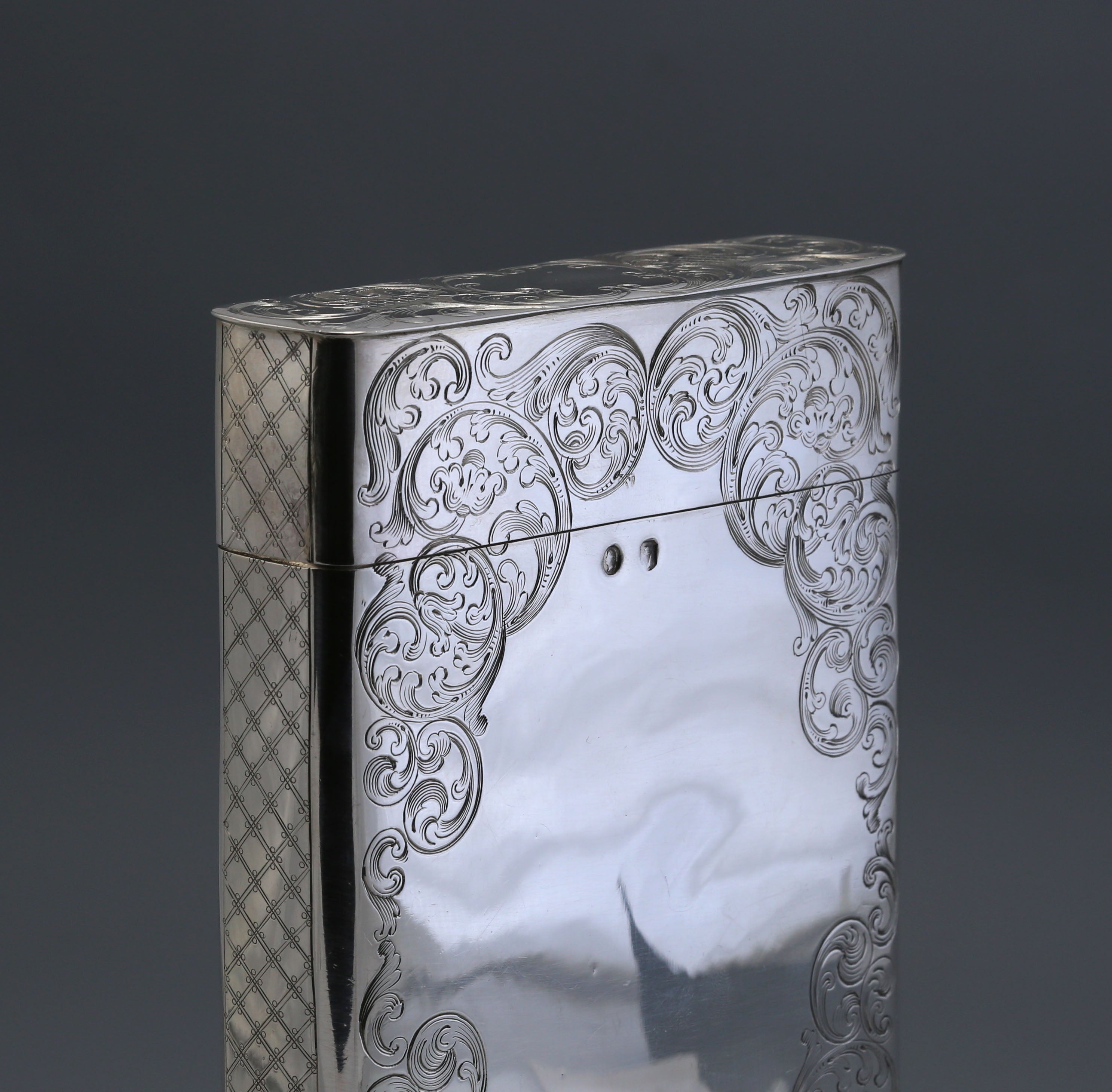 Sterling silver cigar box with engraved scrollwork, made in Dublin, England, 1867-1868.
