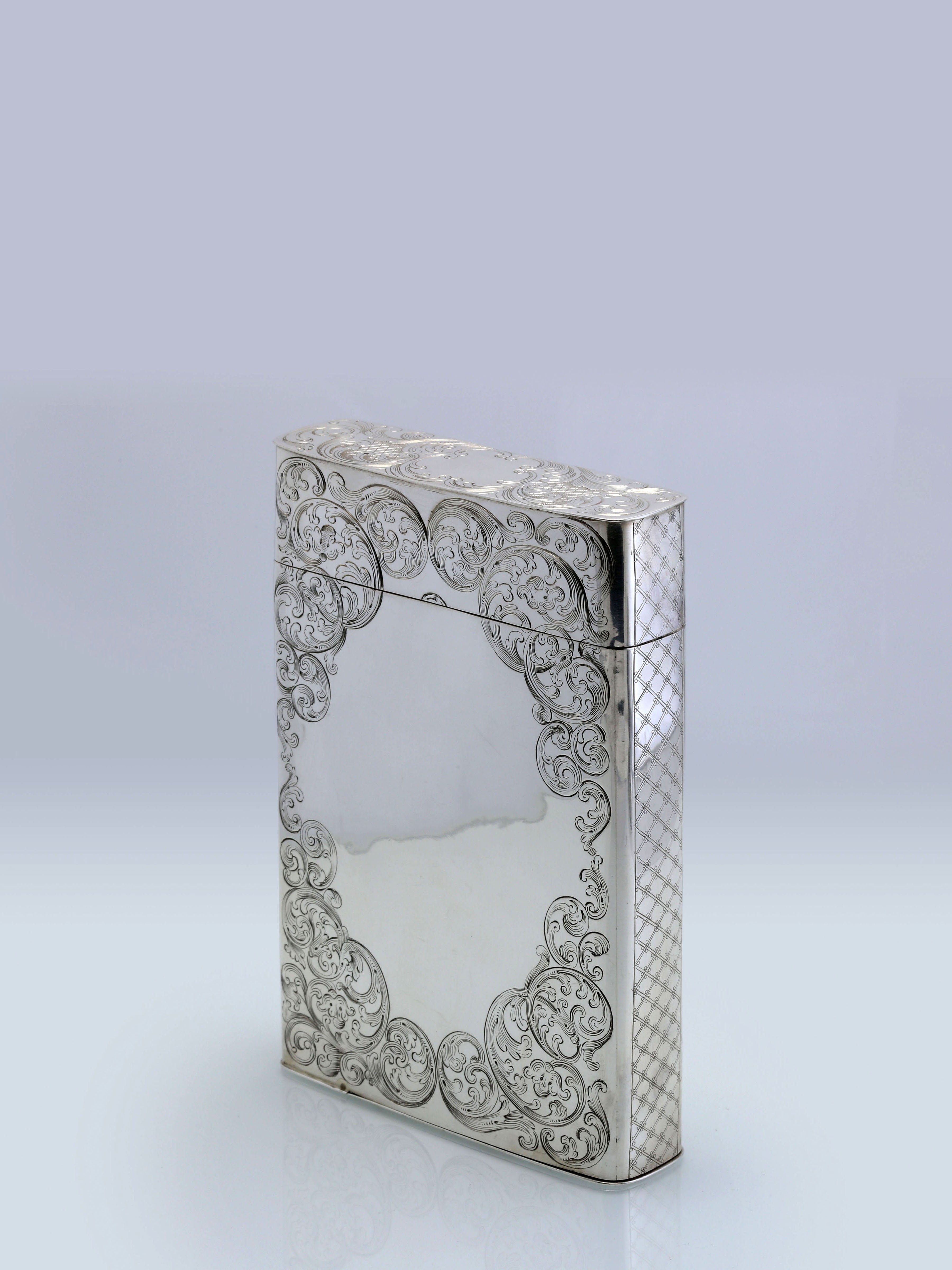 Sterling silver cigar box with engraved scrollwork, made in Dublin, England, 1867-1868.