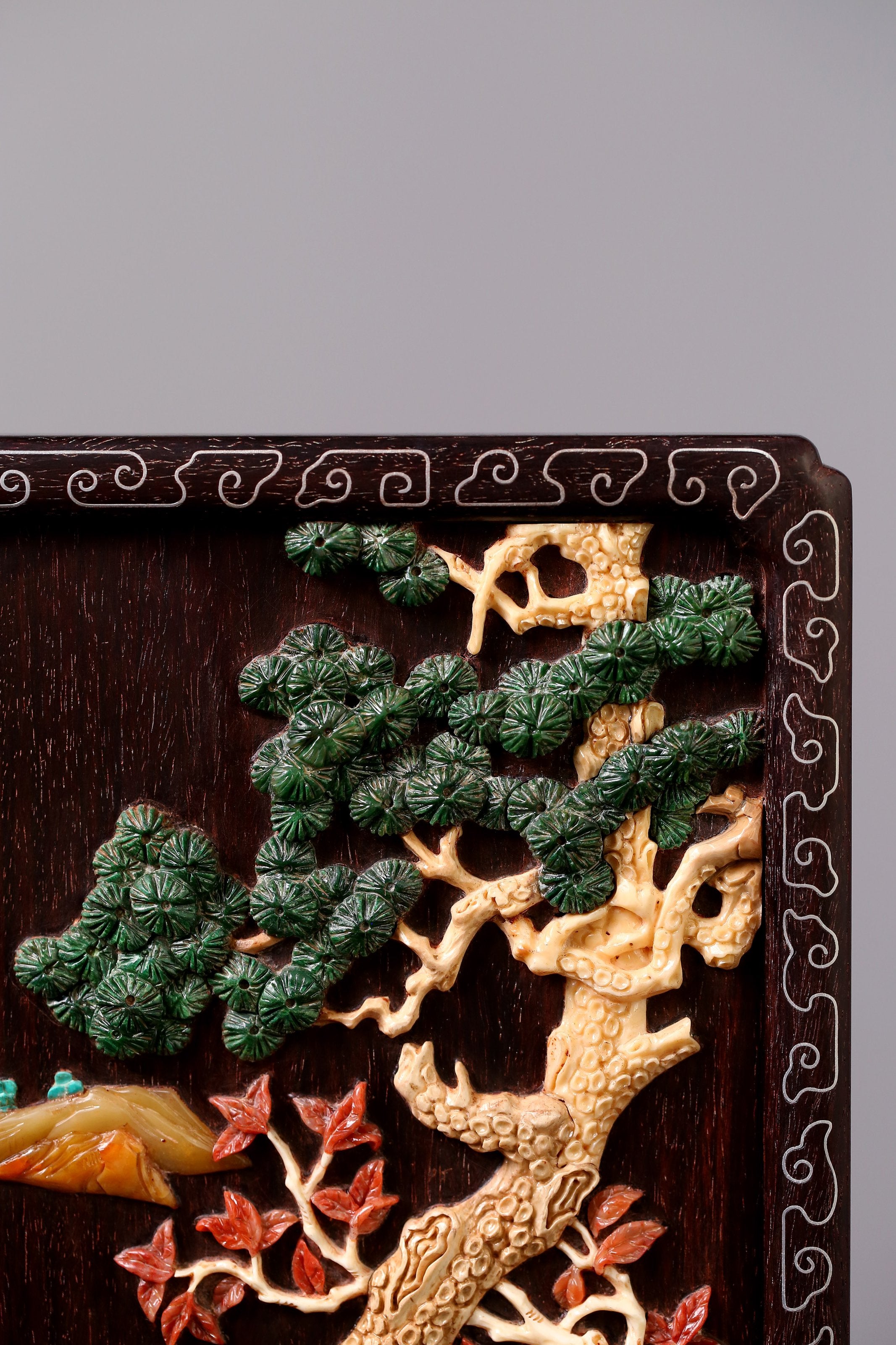 Rosewood screen inlaid with precious stones and silver filigree