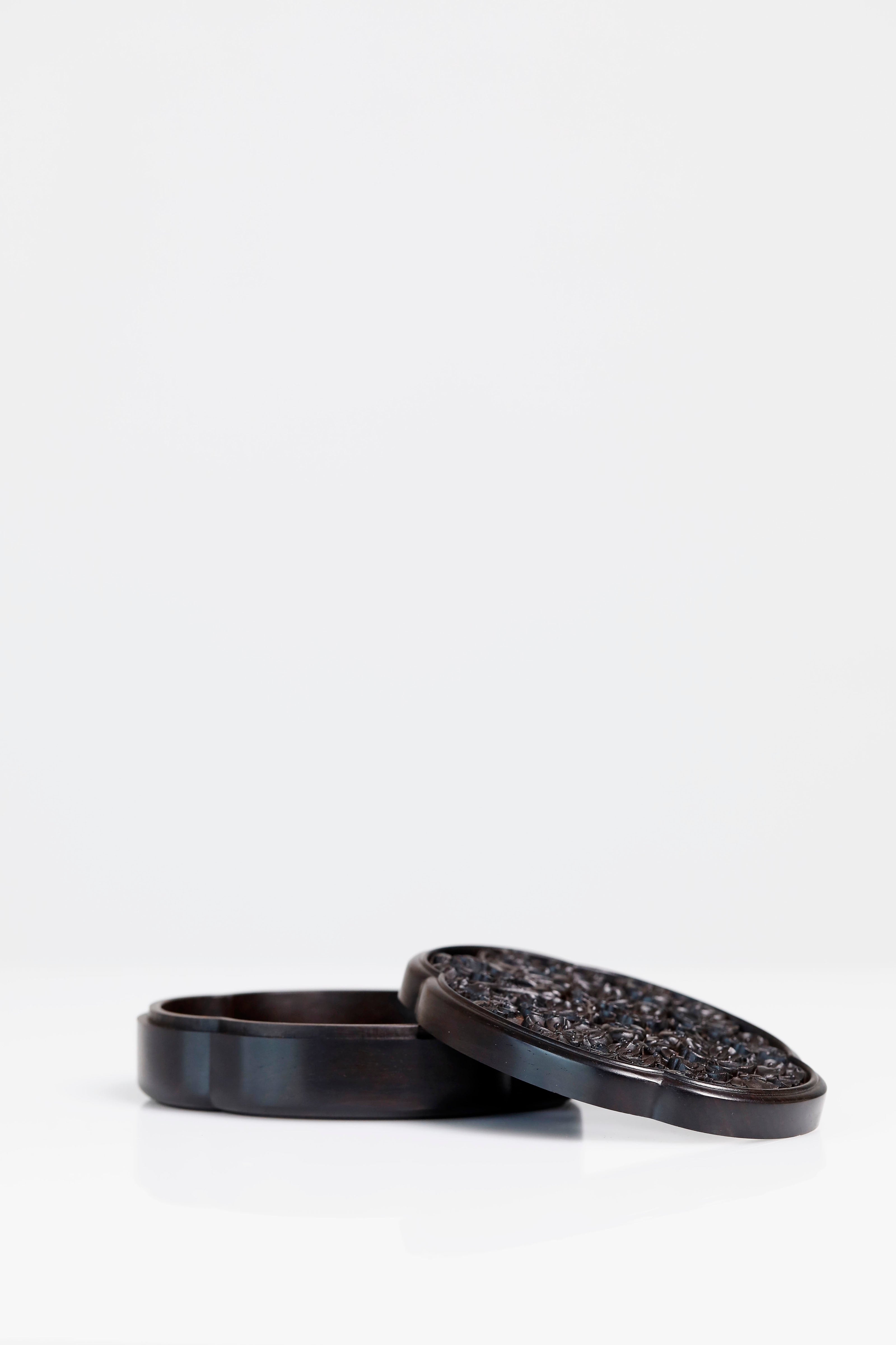 Purple sandalwood hollowed-out plum blossom shaped solid wood incense box