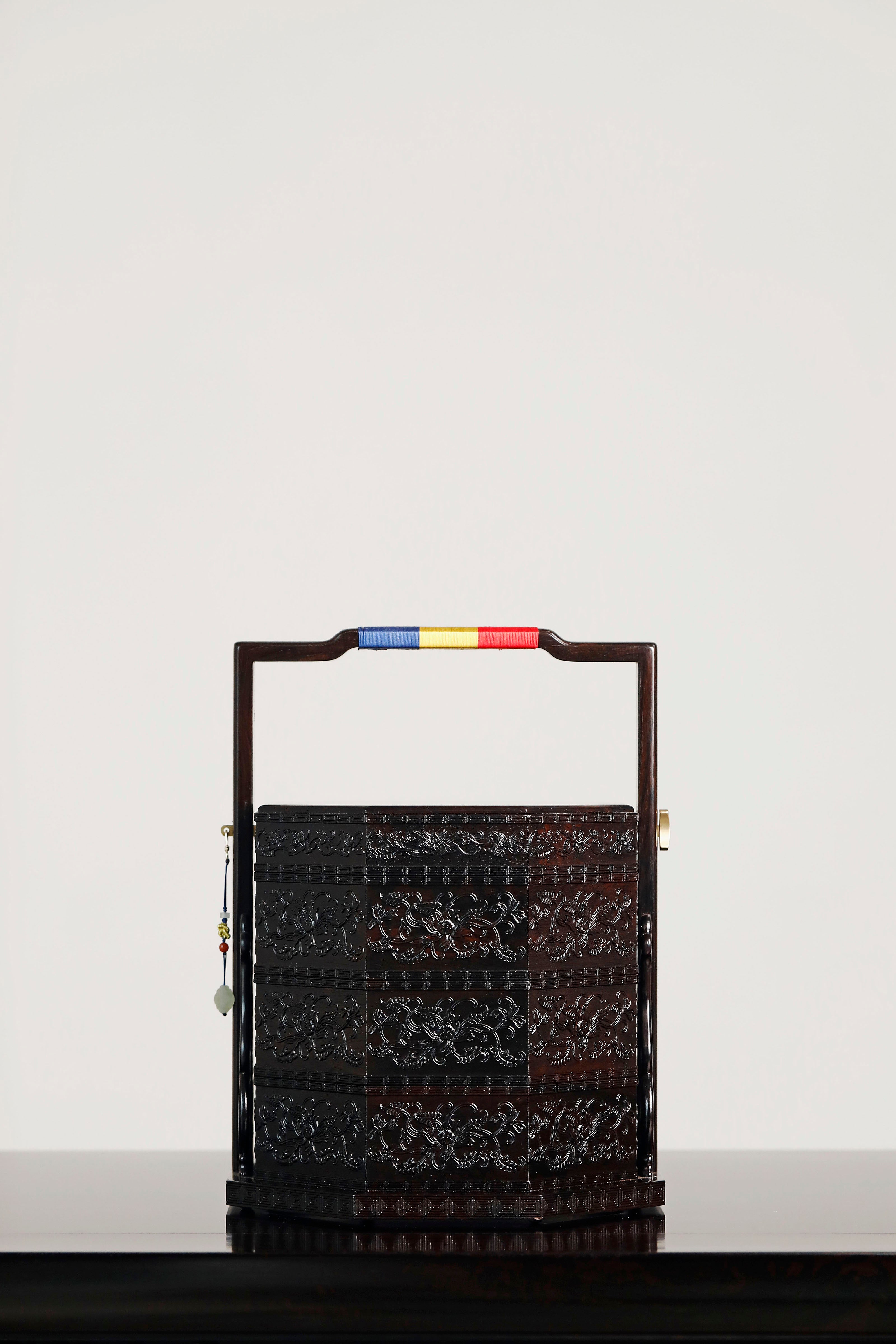 Purple sandalwood inlaid mother-of-pearl octagonal box with eight treasures