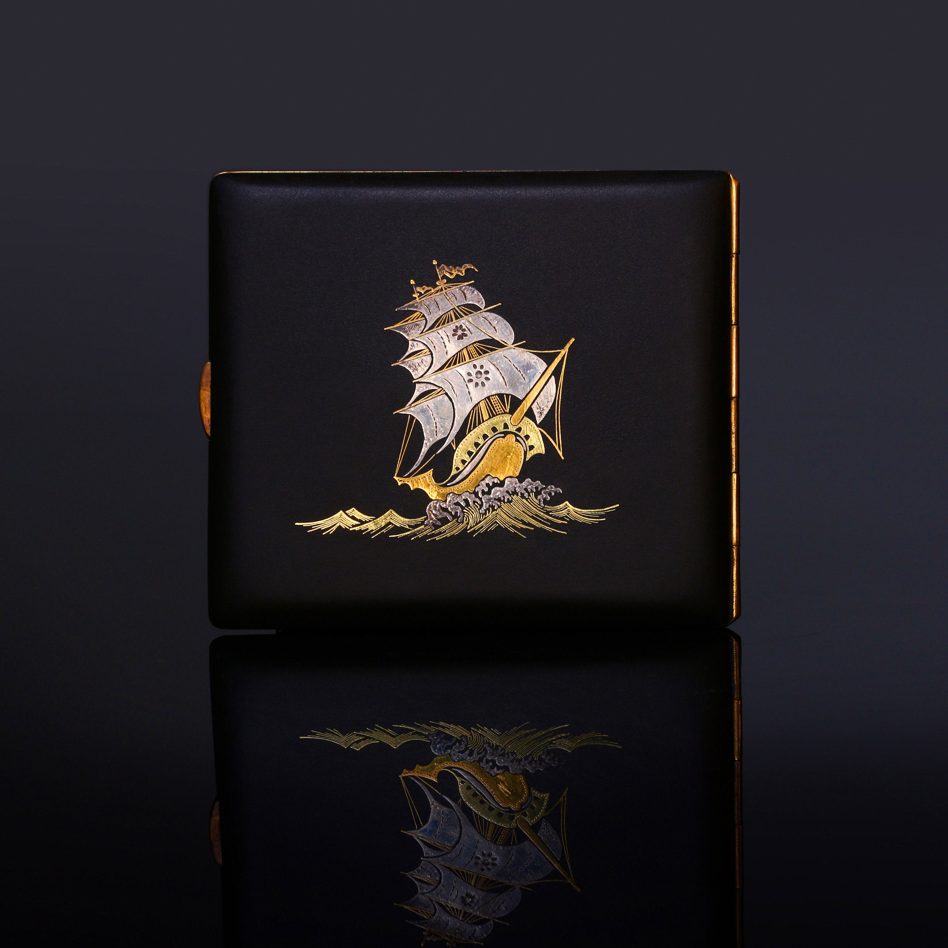 Iron-cut gold "Full Load Return" cigarette box