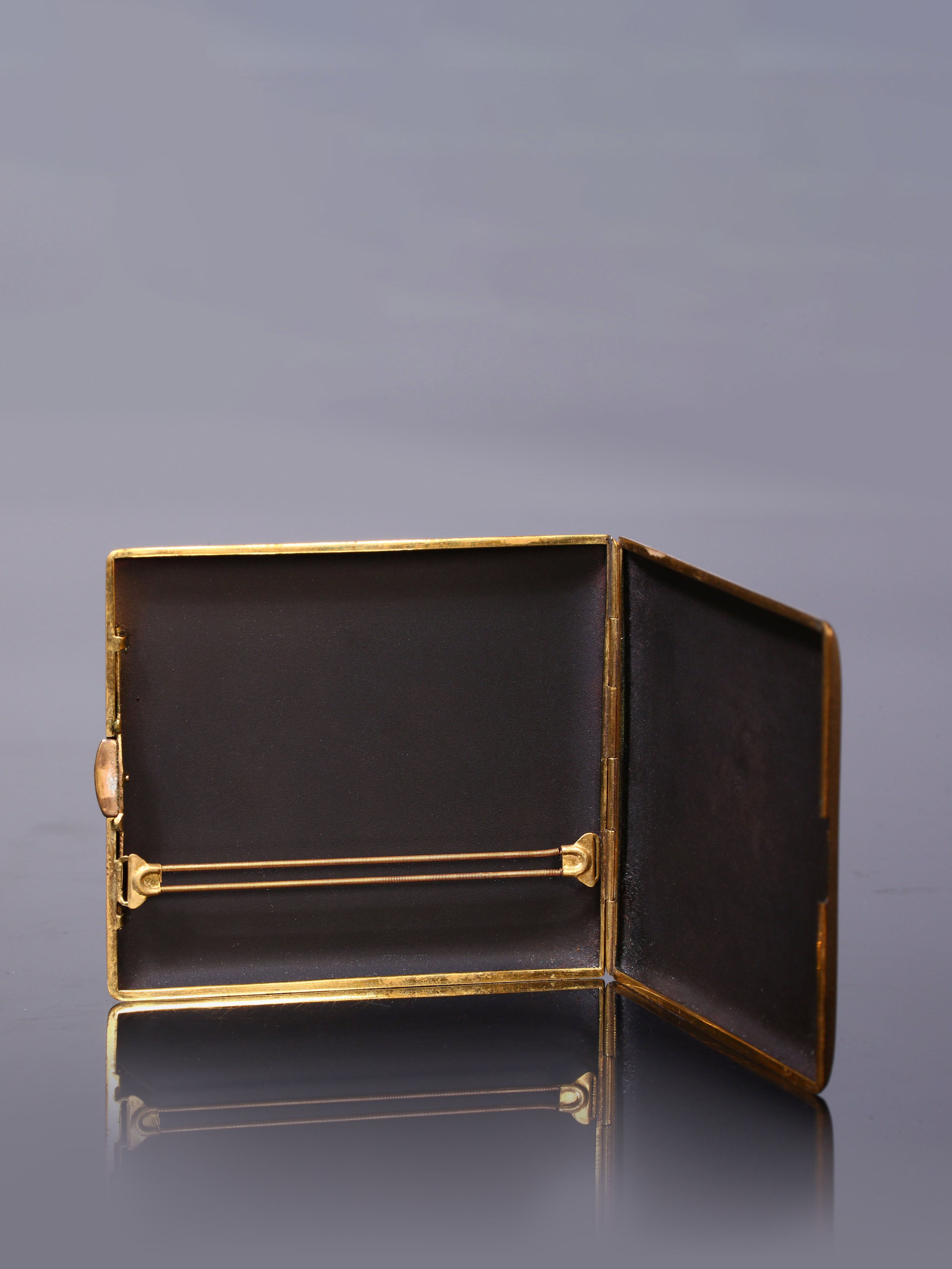 Iron-cut gold "Full Load Return" cigarette box