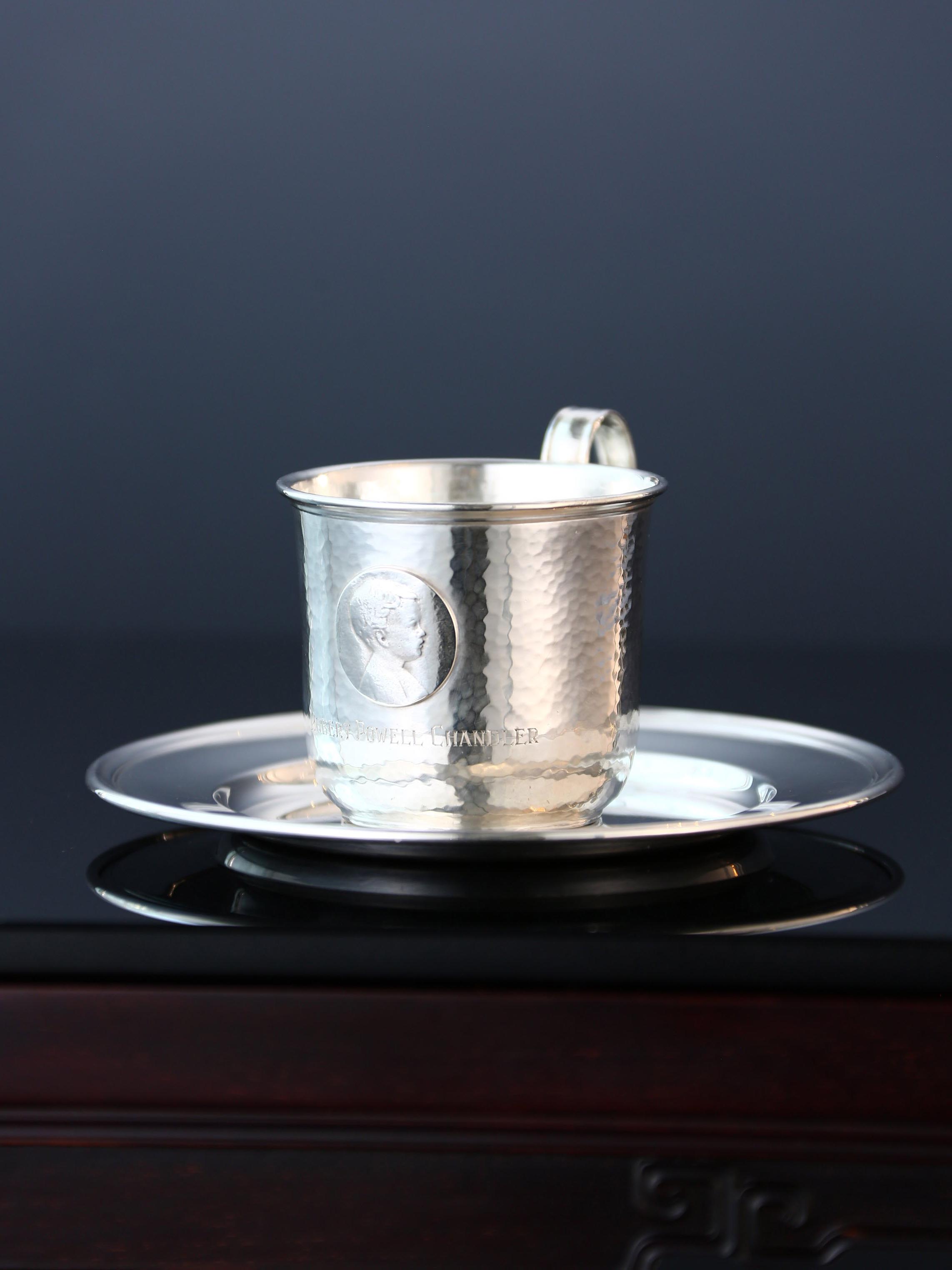A set of 19th-century American sterling silver hammered teacups