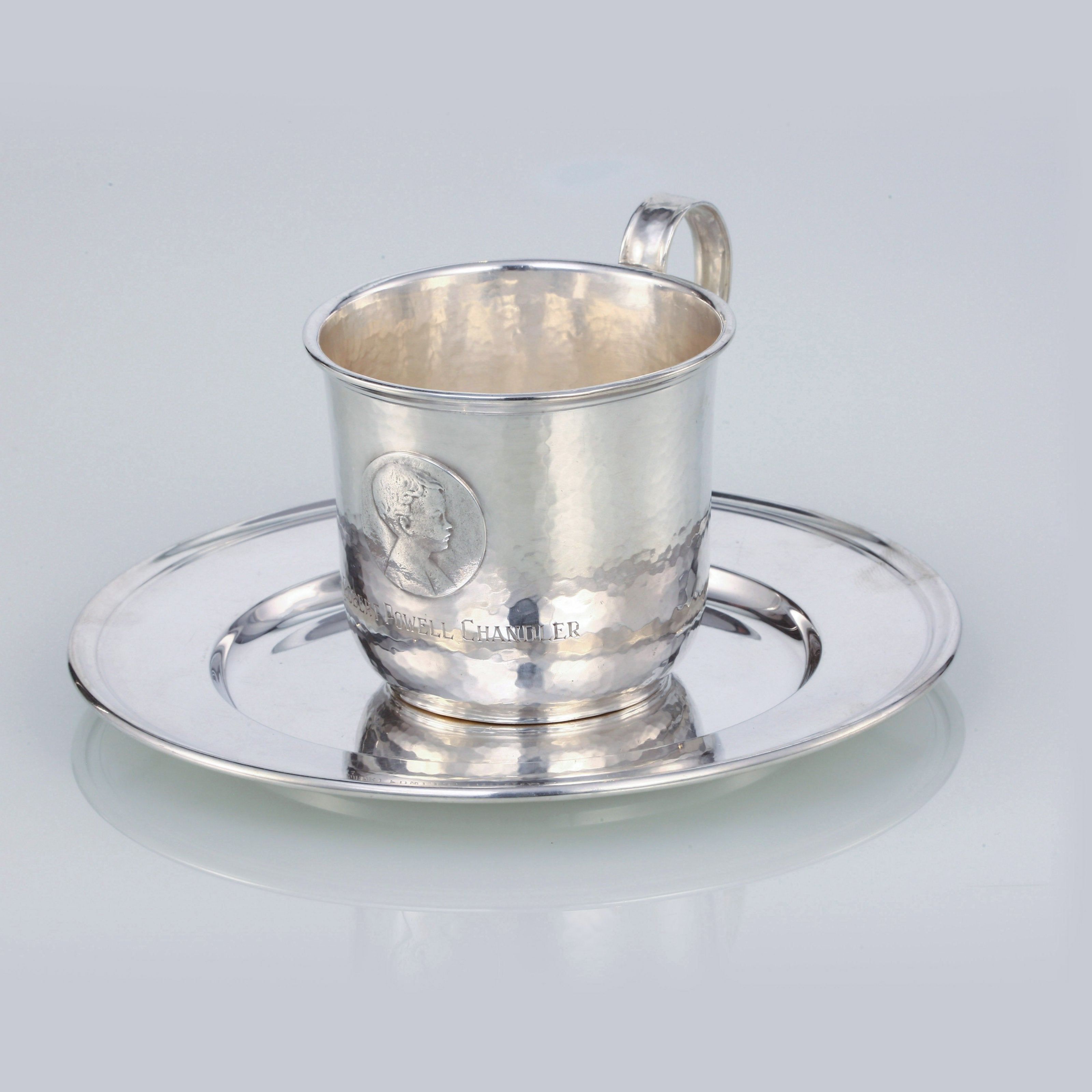A set of 19th-century American sterling silver hammered teacups