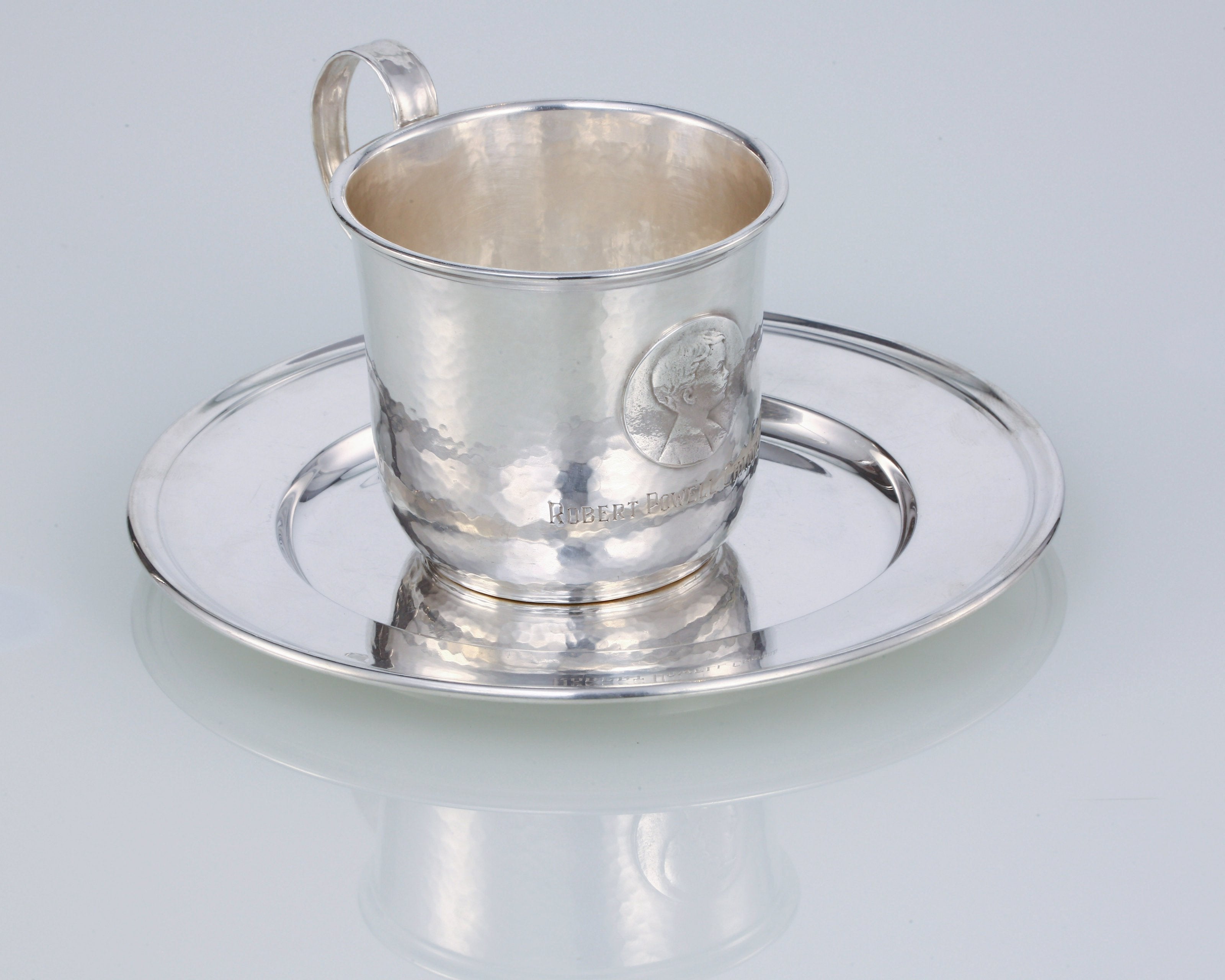 A set of 19th-century American sterling silver hammered teacups