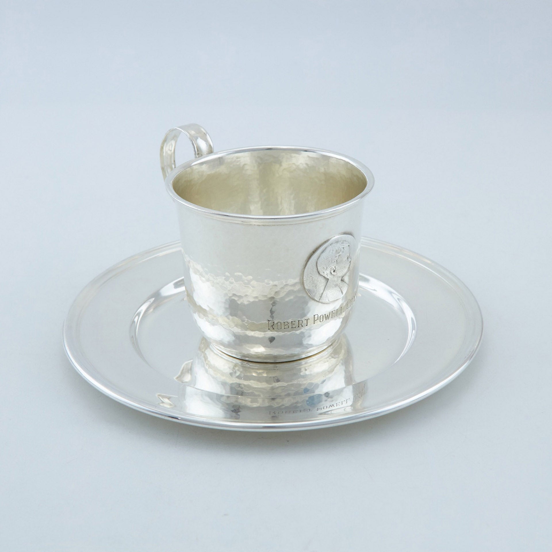 A set of 19th-century American sterling silver hammered teacups