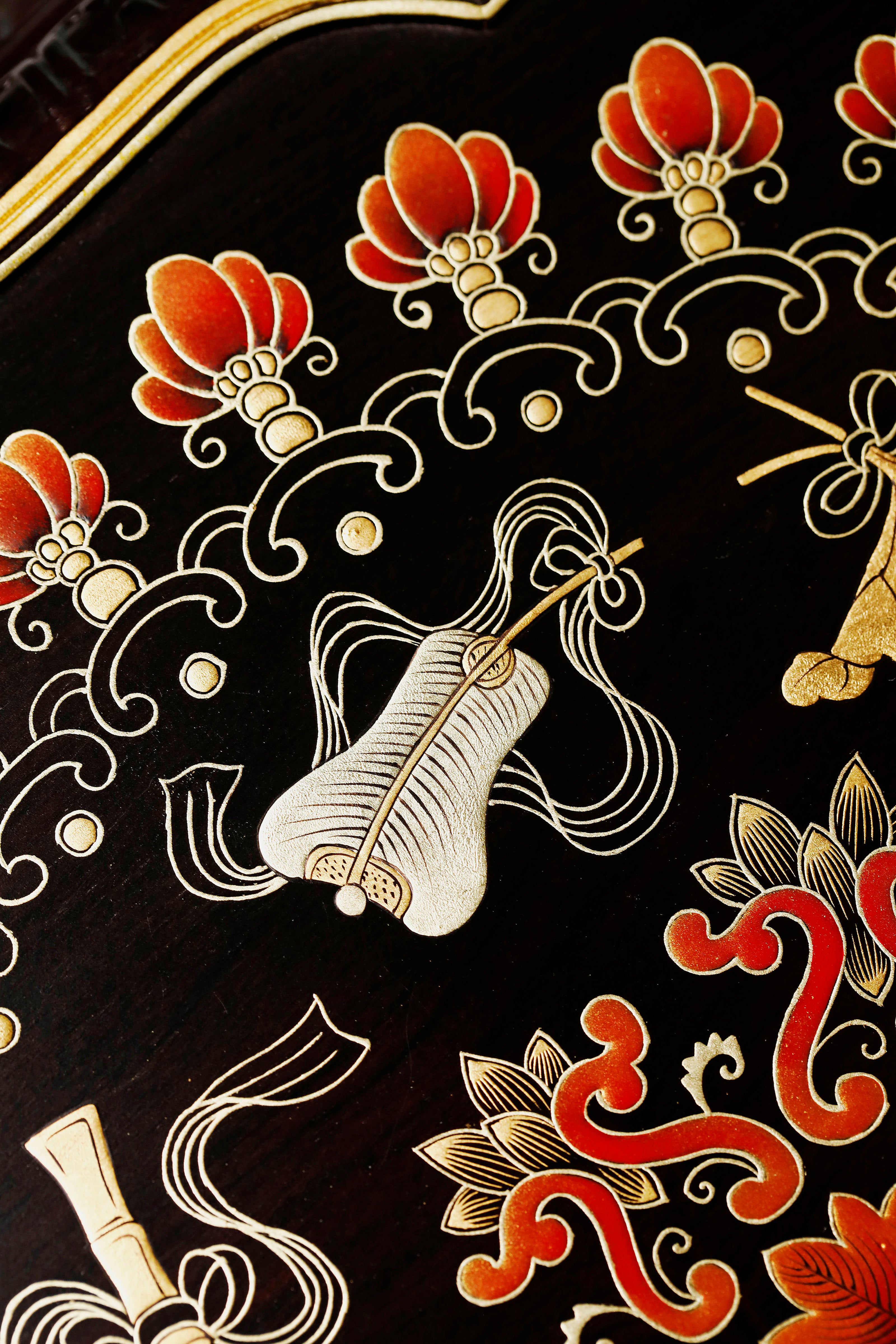 Purple sandalwood twelve-cornered fruit box with gilded Eight Immortals design and sunflower-shaped opening.