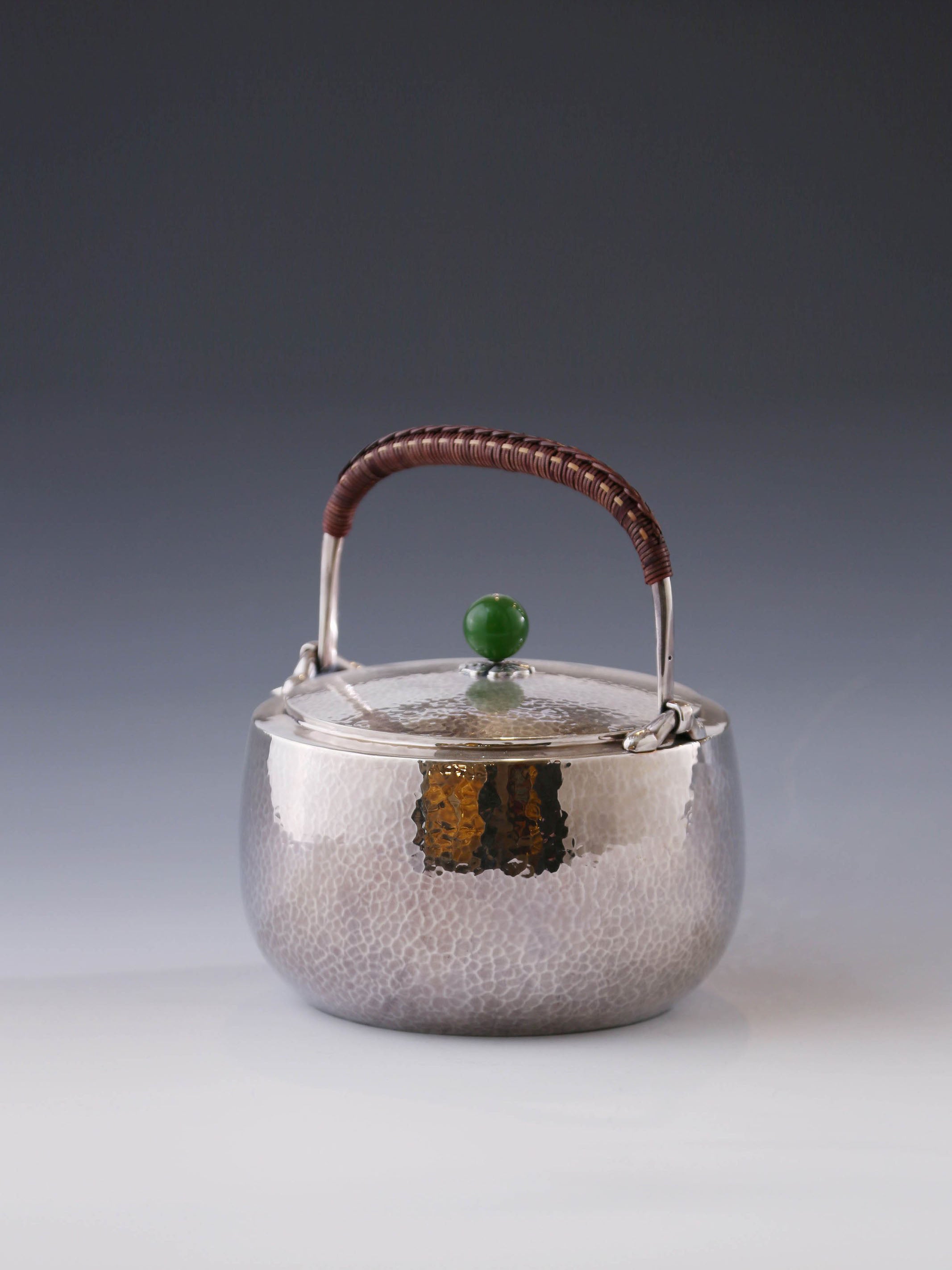 Flat-necked hammered jade silver ewer