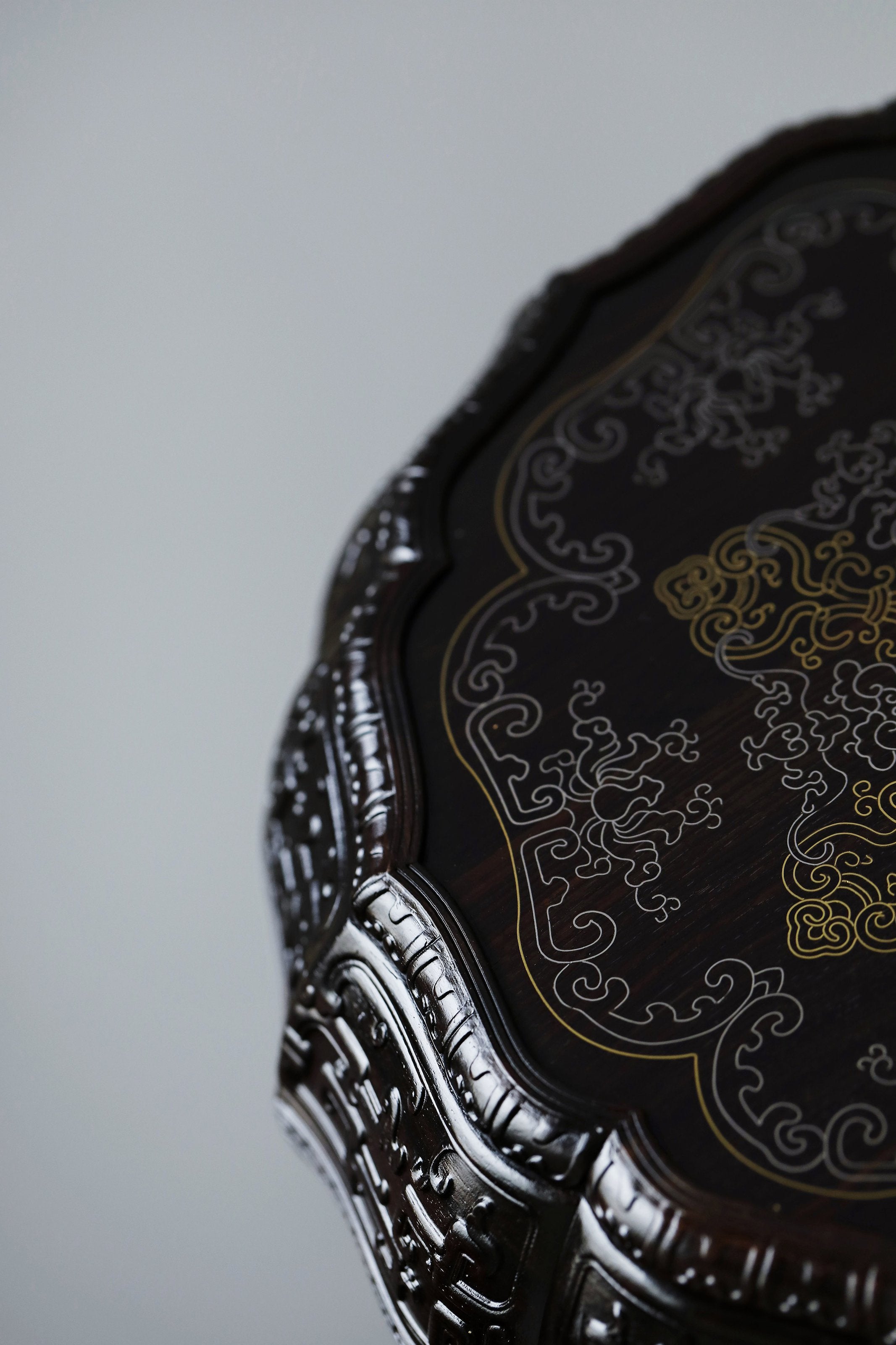 Purple sandalwood twelve-cornered fruit box inlaid with silver wire scrolling floral pattern