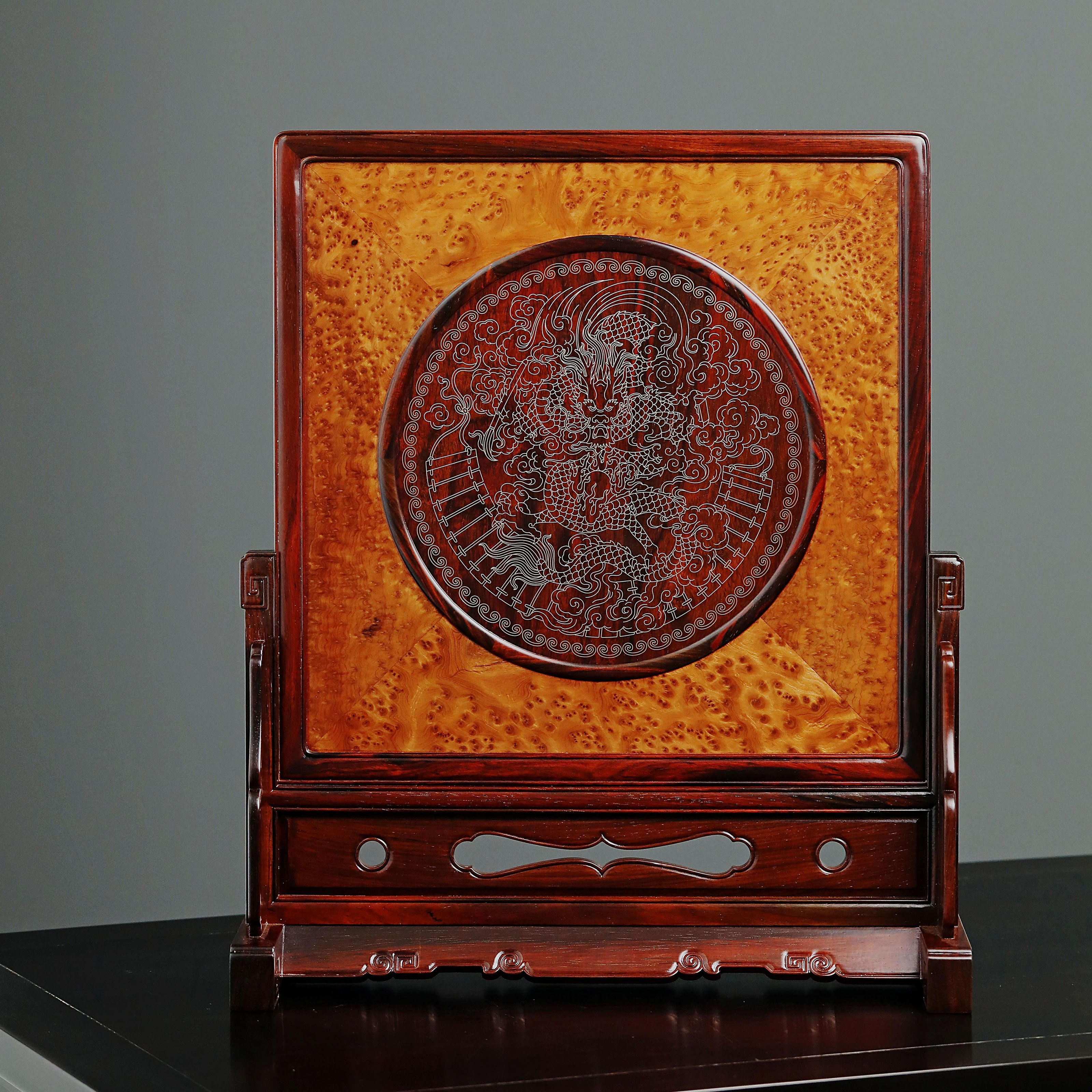 Rosewood screen inlaid with silver dragon design