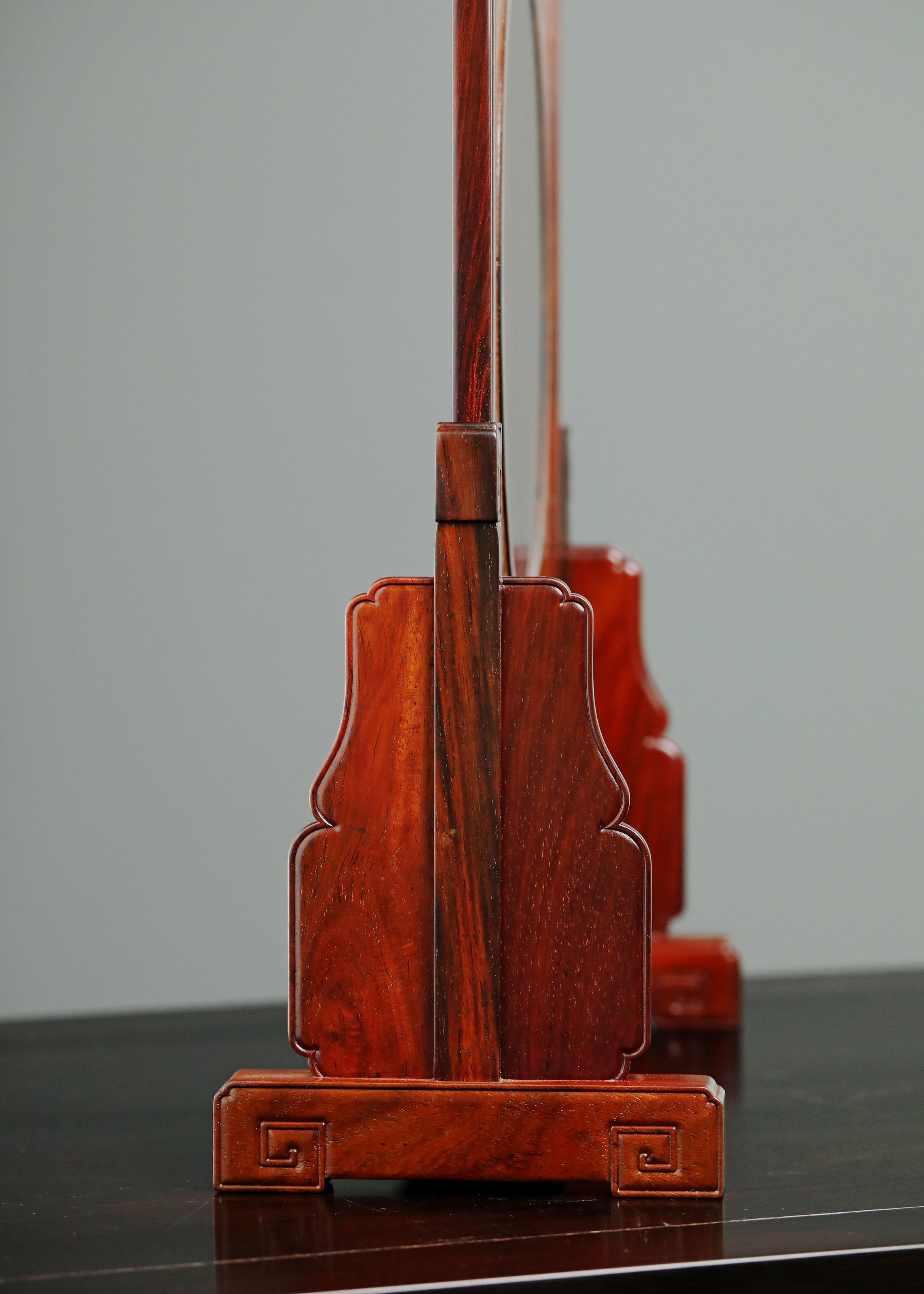 Rosewood screen inlaid with silver dragon design