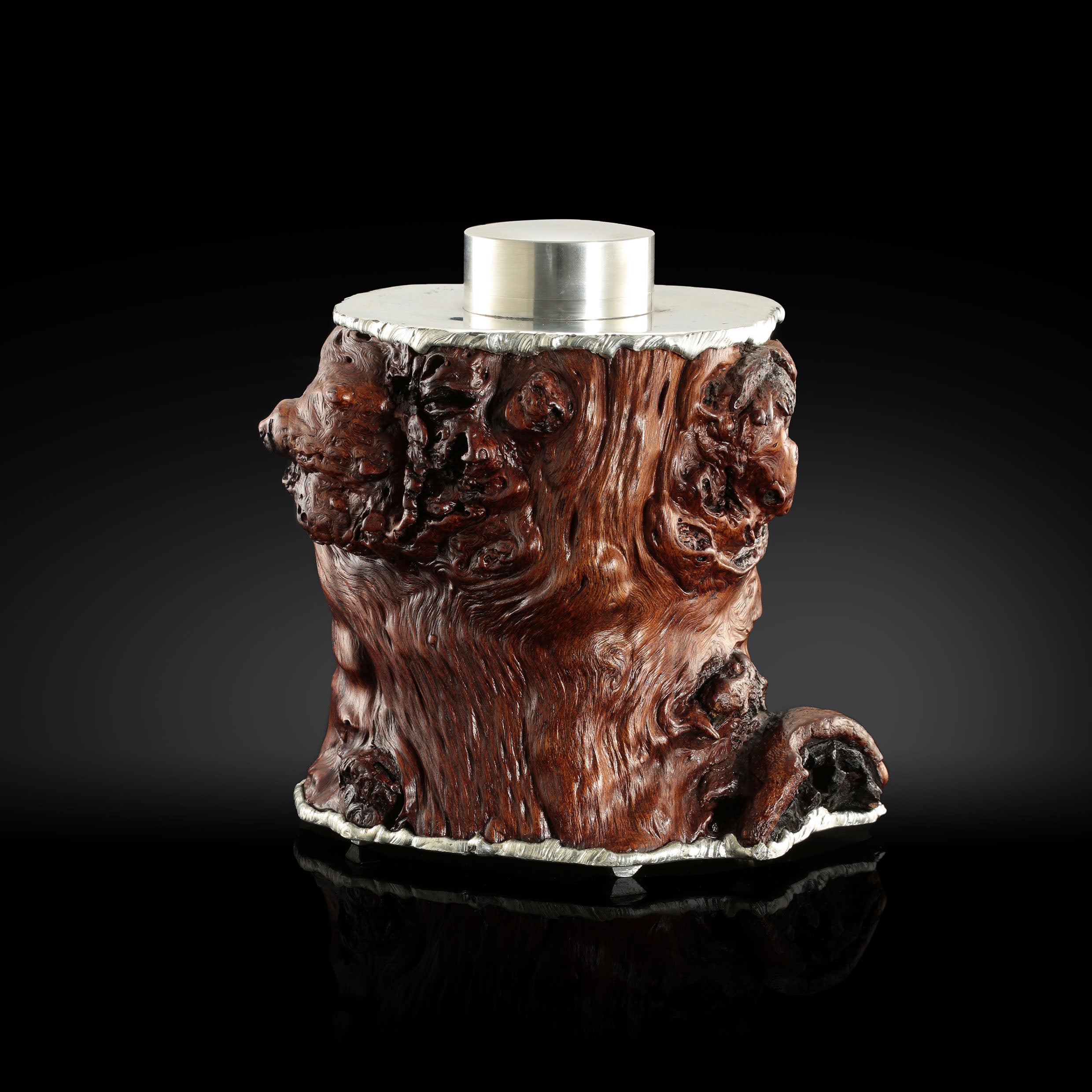 Gnarled branches and tin-carved burl wood tea caddy