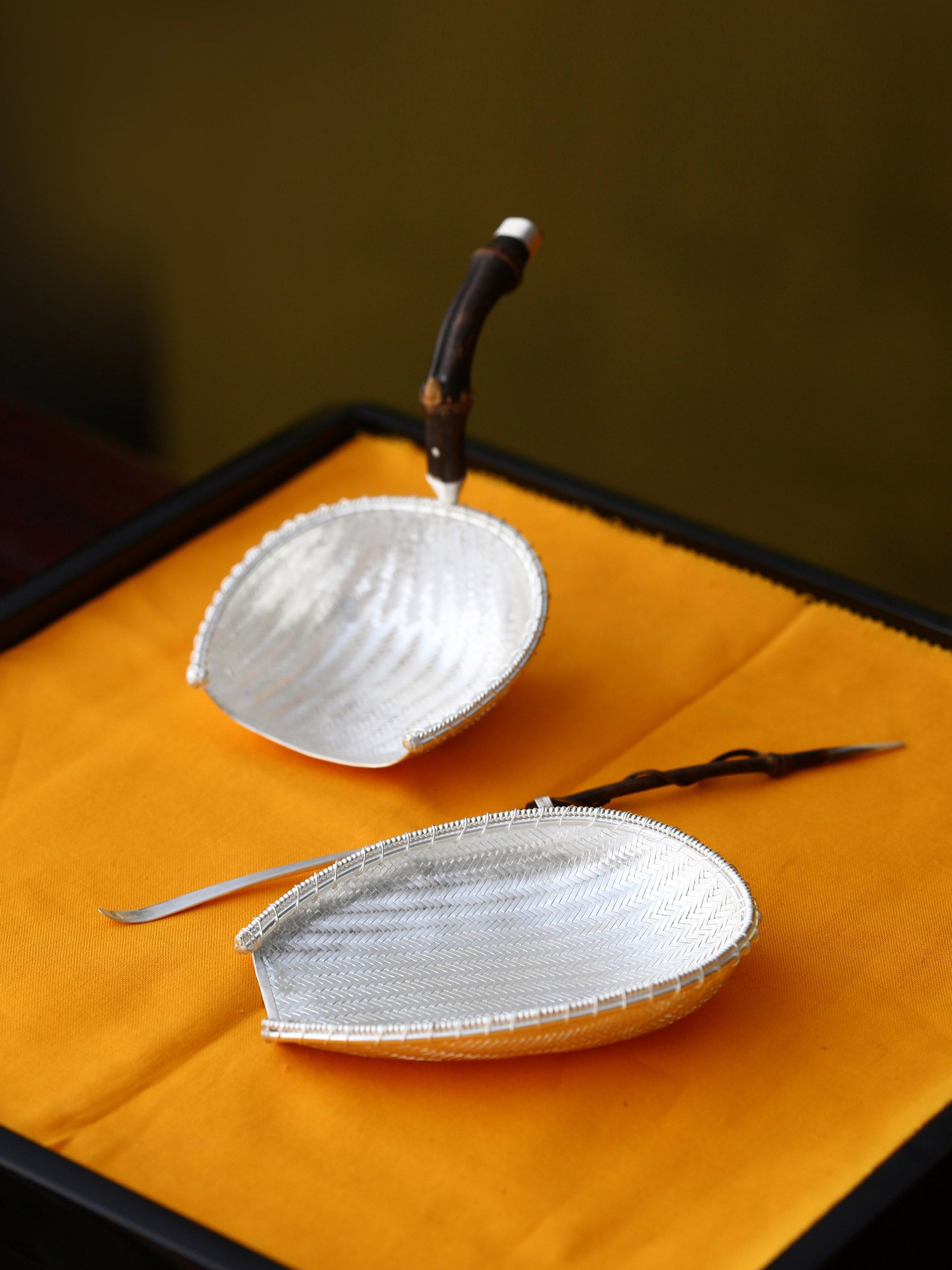 Tea strainers, tea scoops, and tea pitchers that bring in a fortune every day.