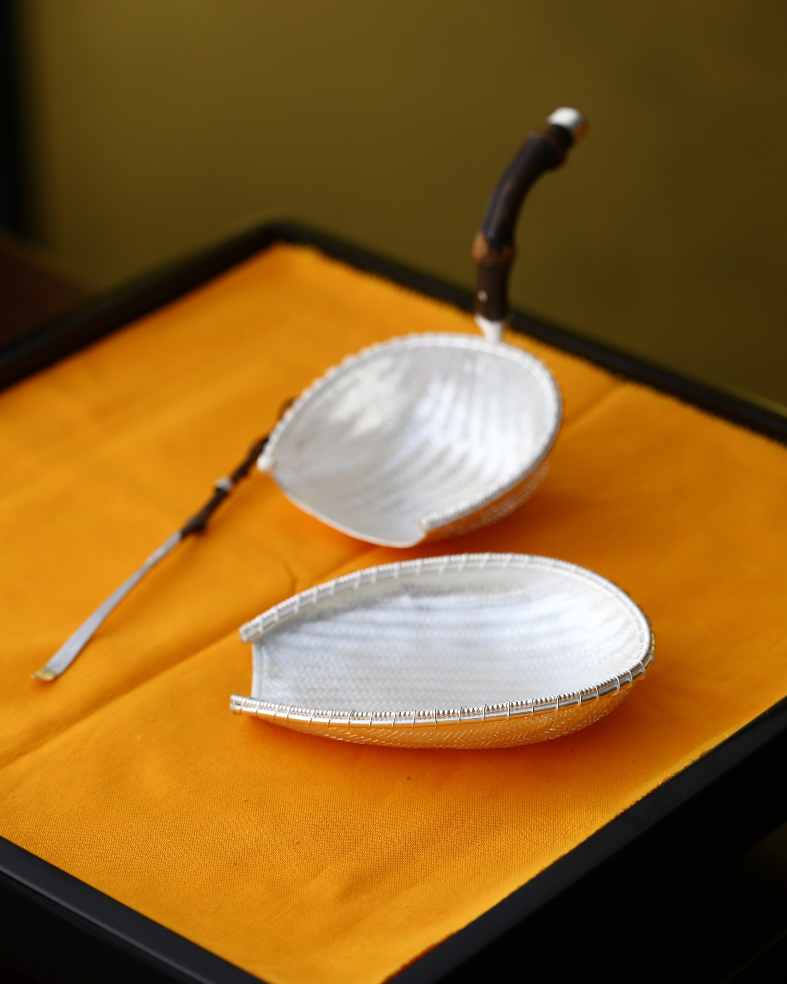 Tea strainers, tea scoops, and tea pitchers that bring in a fortune every day.