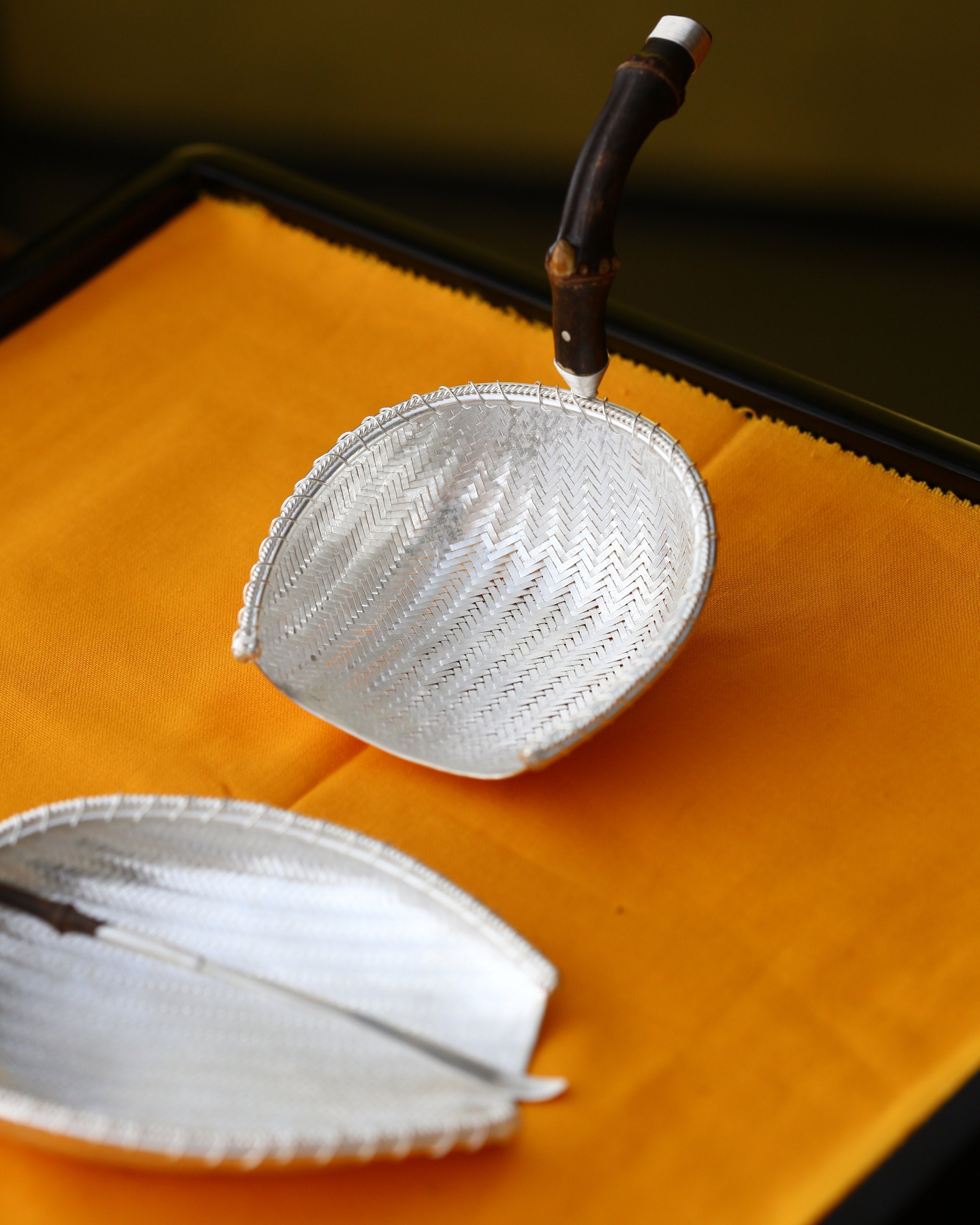 Tea strainers, tea scoops, and tea pitchers that bring in a fortune every day.