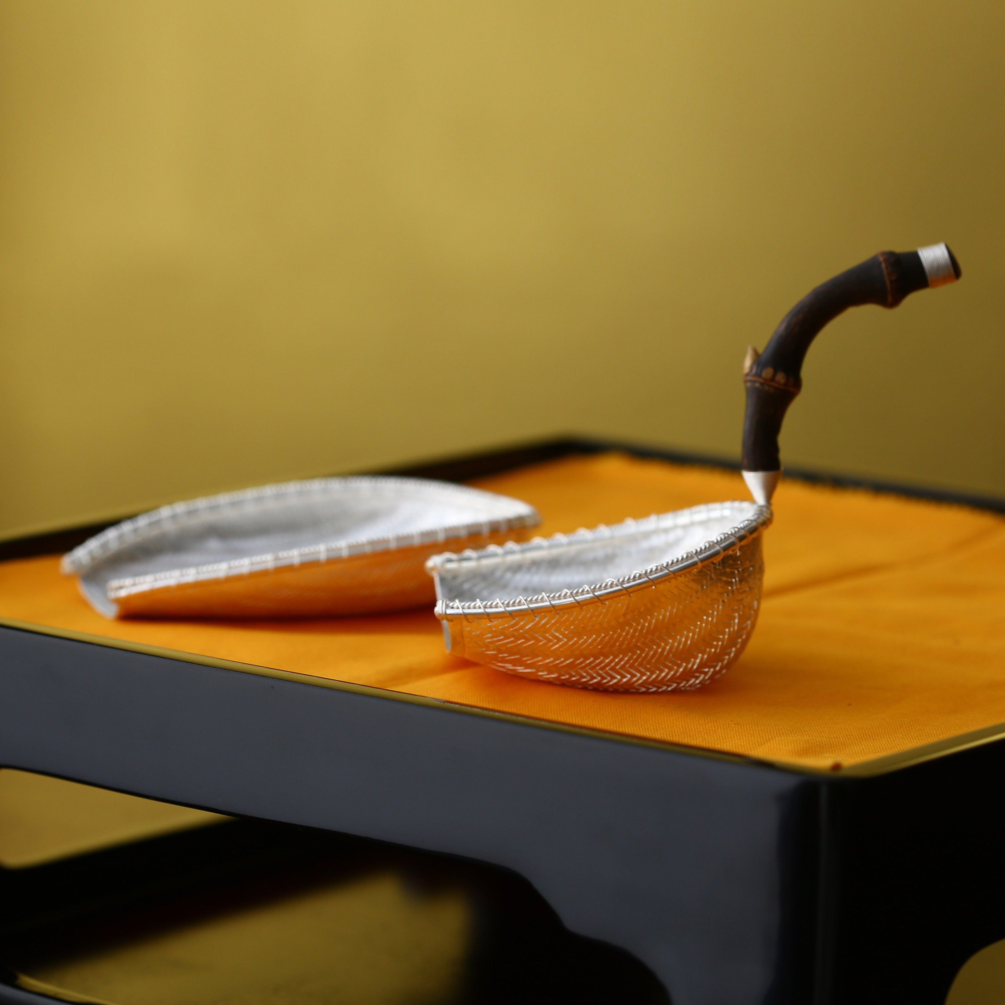 Tea strainers, tea scoops, and tea pitchers that bring in a fortune every day.