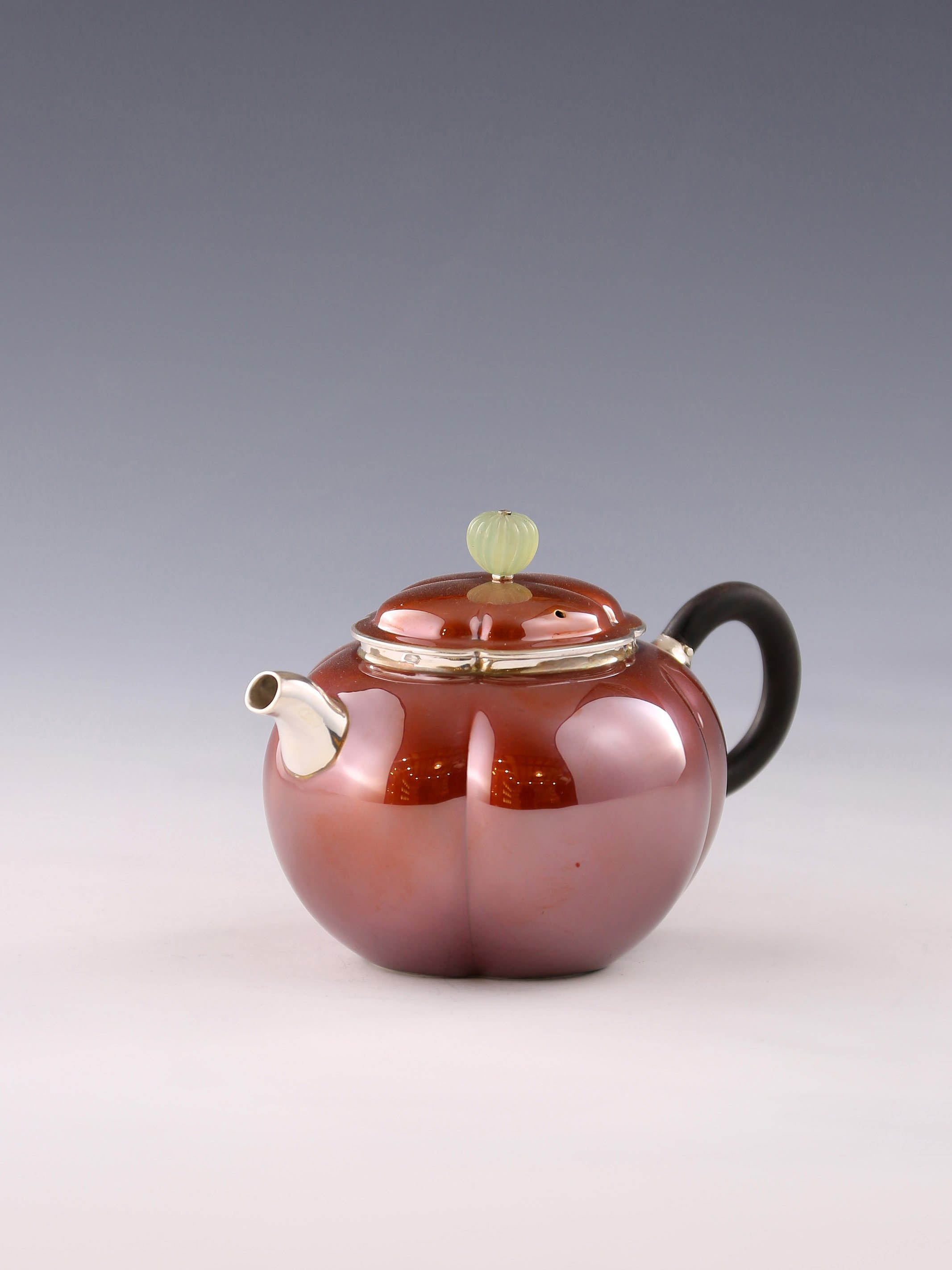 A set of Ruyi petal-shaped copper-plated silver teapot and serving cup
