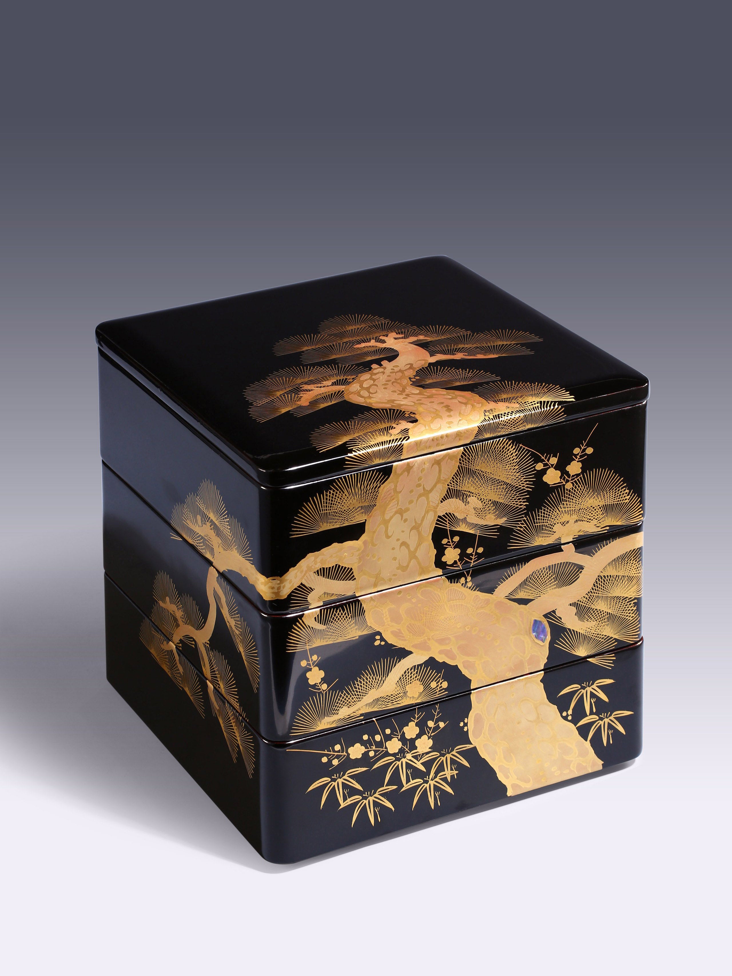 Japanese Meiji period tea box with pine, bamboo, and plum design, tea stall with chrysanthemum pattern.
