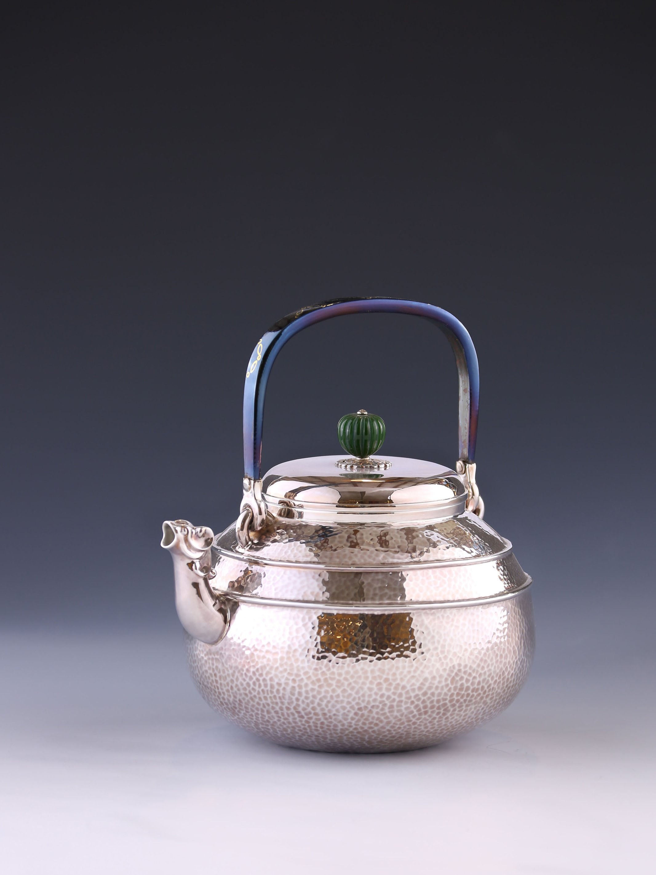 Silver ewer with animal-shaped mouth and double waistline