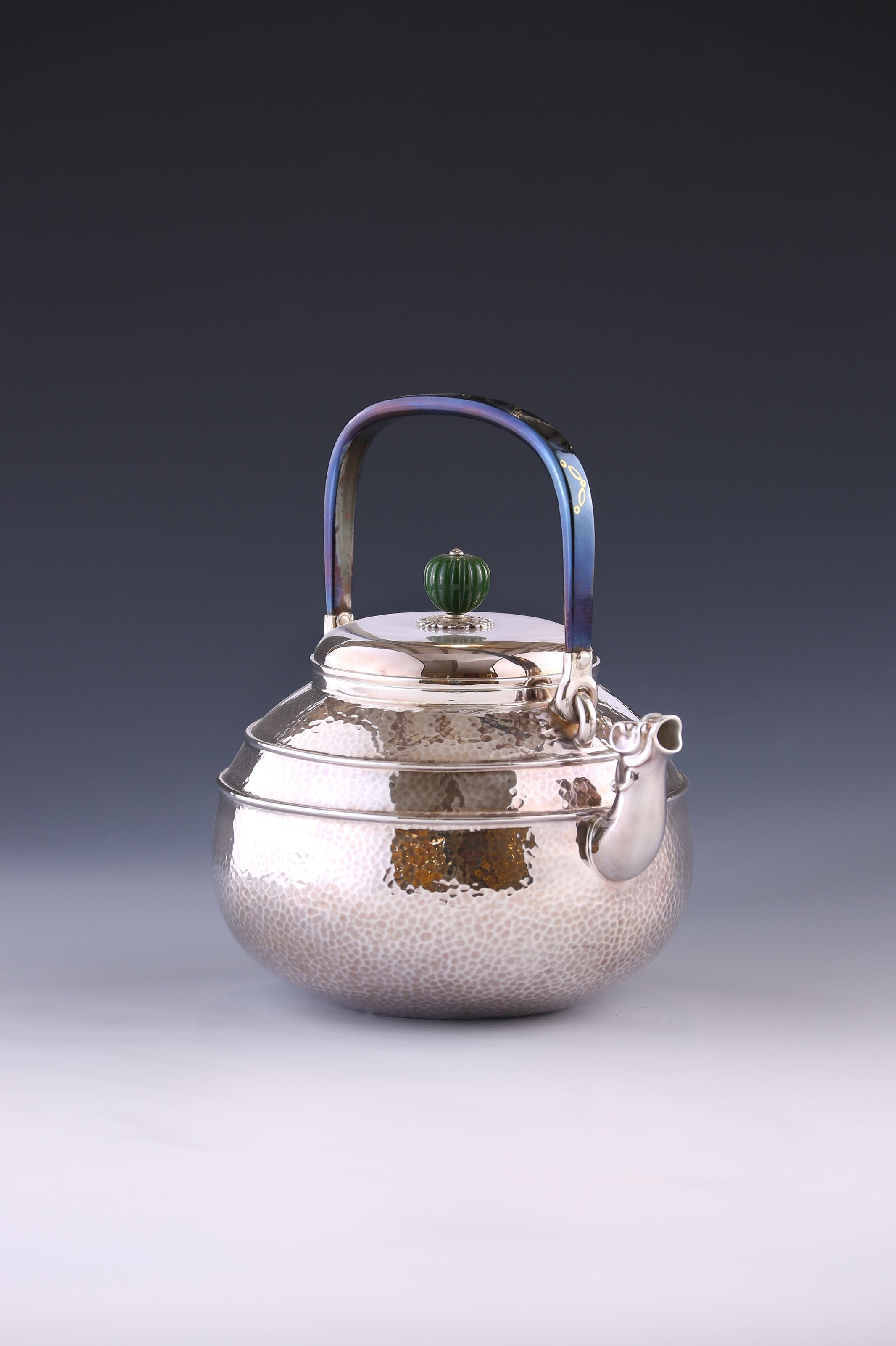 Silver ewer with animal-shaped mouth and double waistline