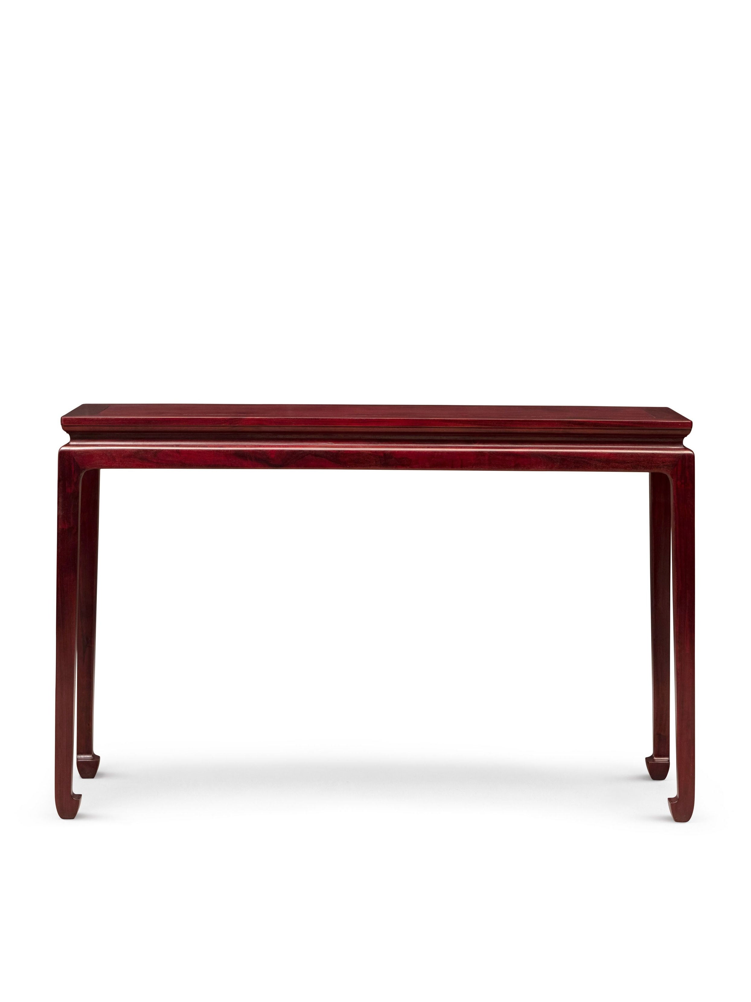 Long table with waisted legs and hoof feet