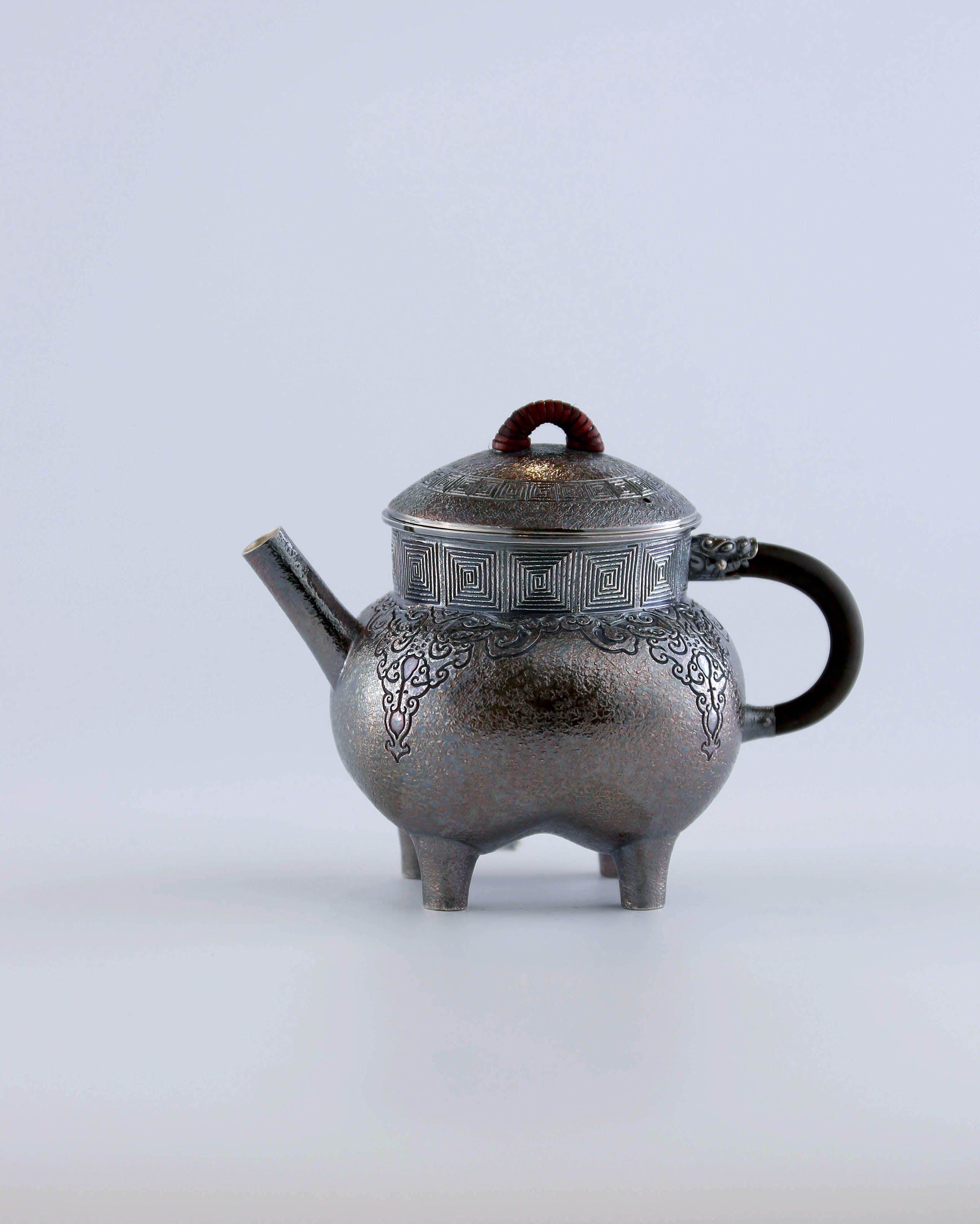 Four-legged silver ewer with dragon design