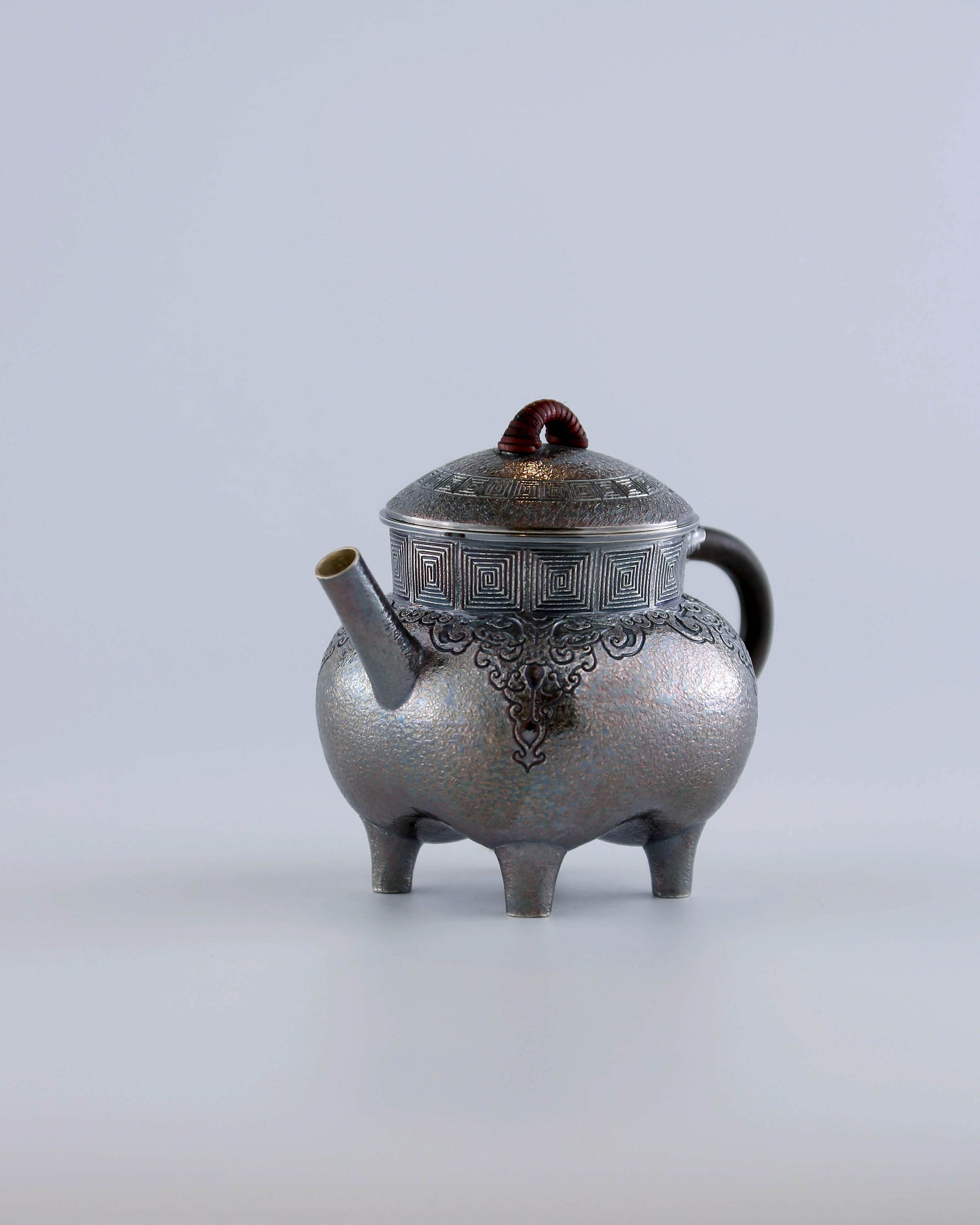 Four-legged silver ewer with dragon design