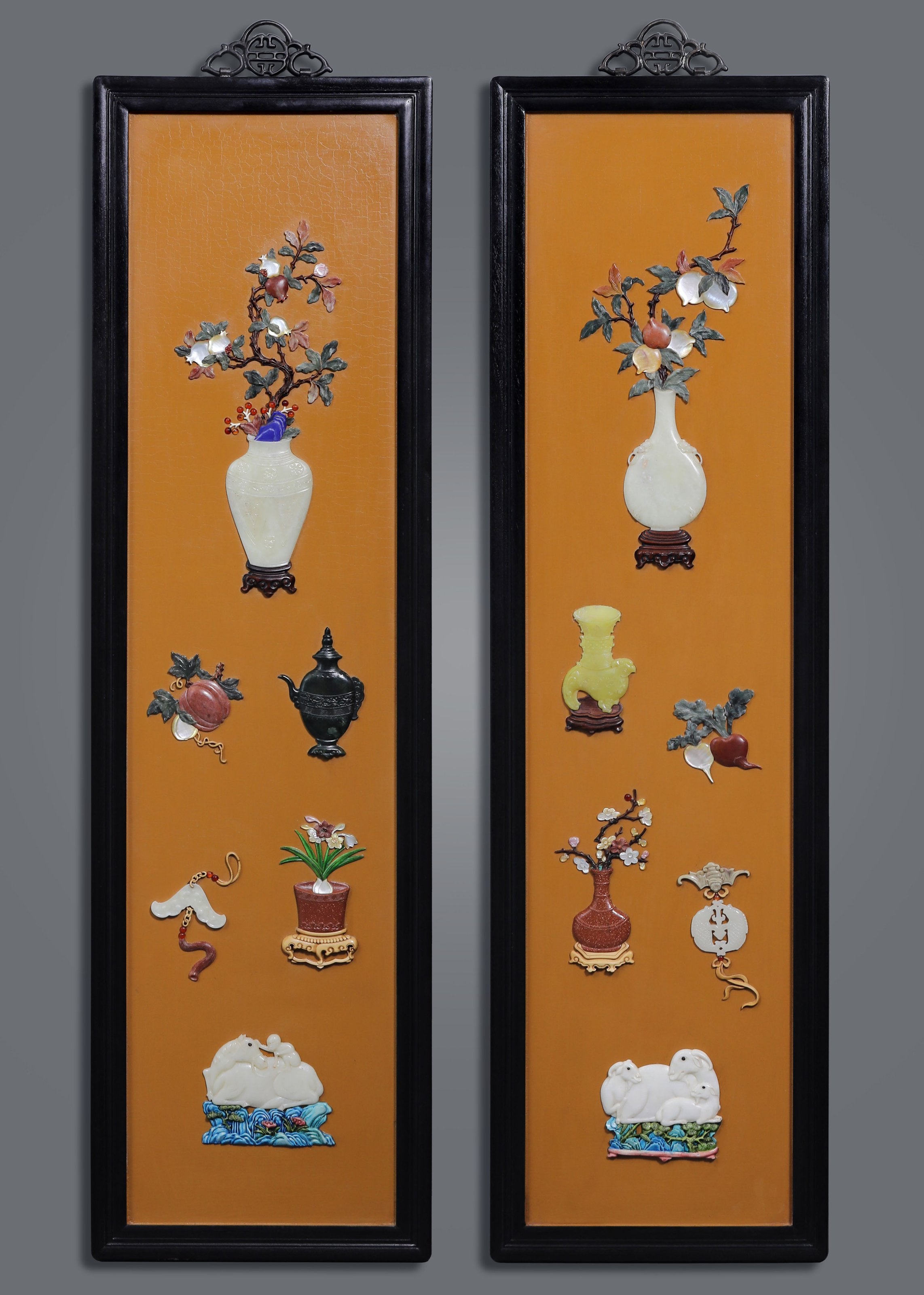 A hanging screen inlaid with precious stones, symbolizing peace and prosperity.