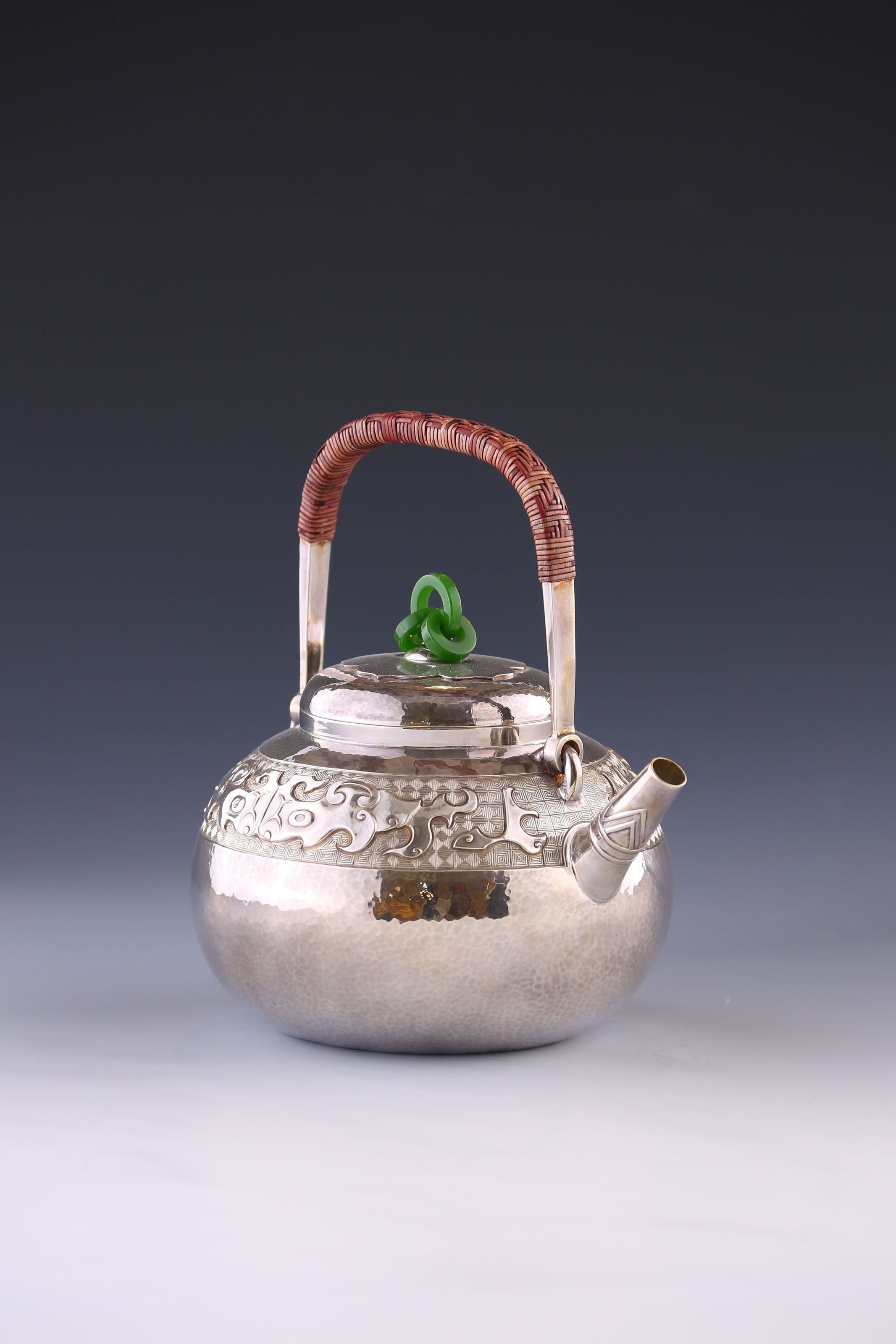 Silver ewer in the shape of a taotie pattern