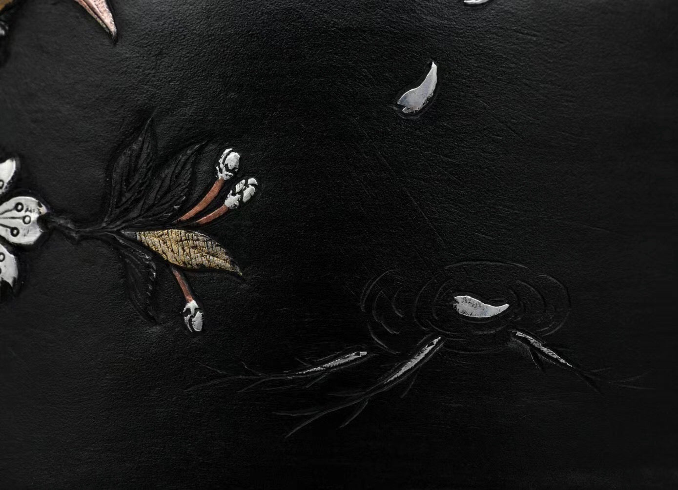 Iron-clad silver flower and bird inlaid gold and silver teapot