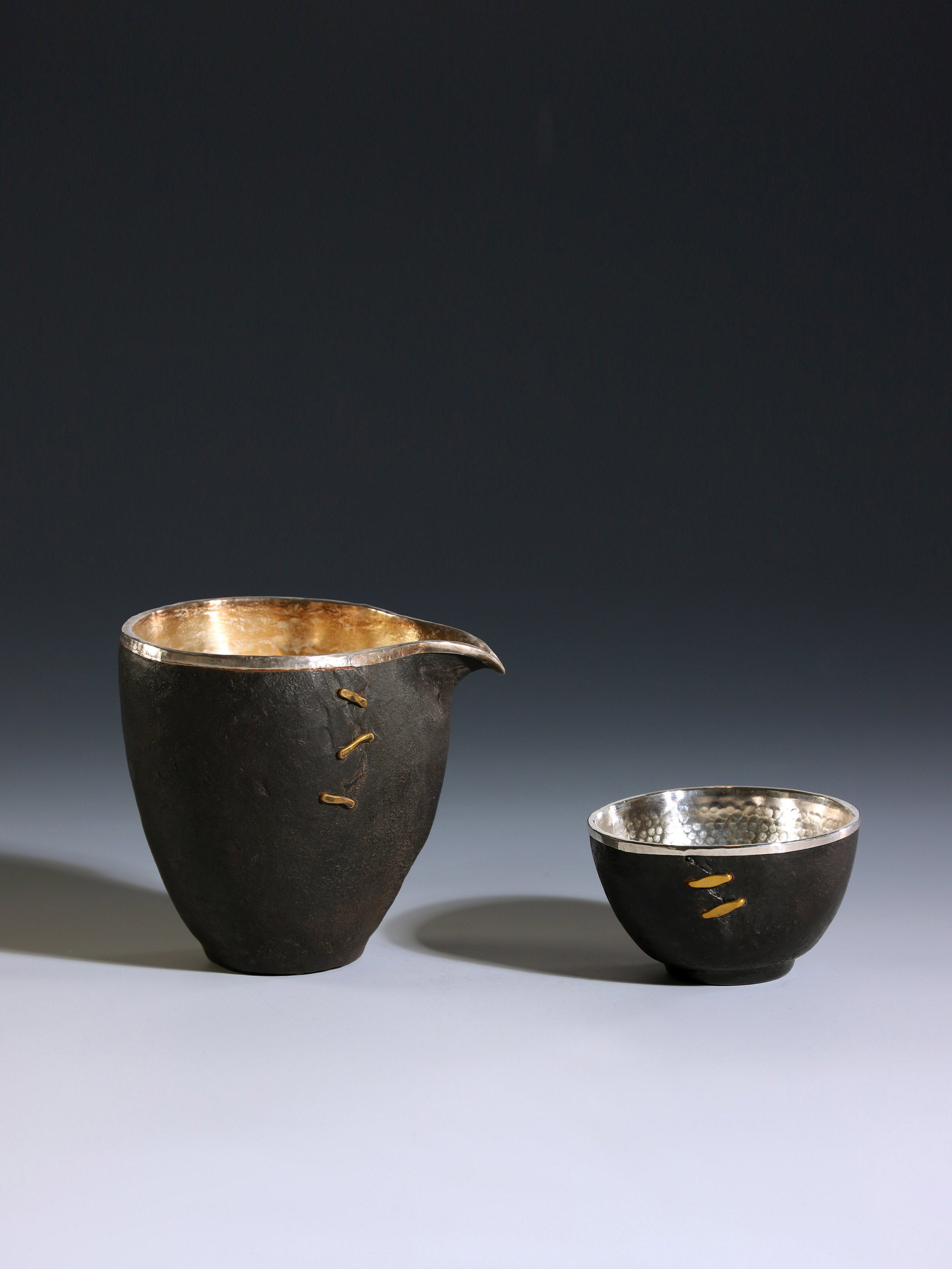 Iron-clad silver-studded fair cup