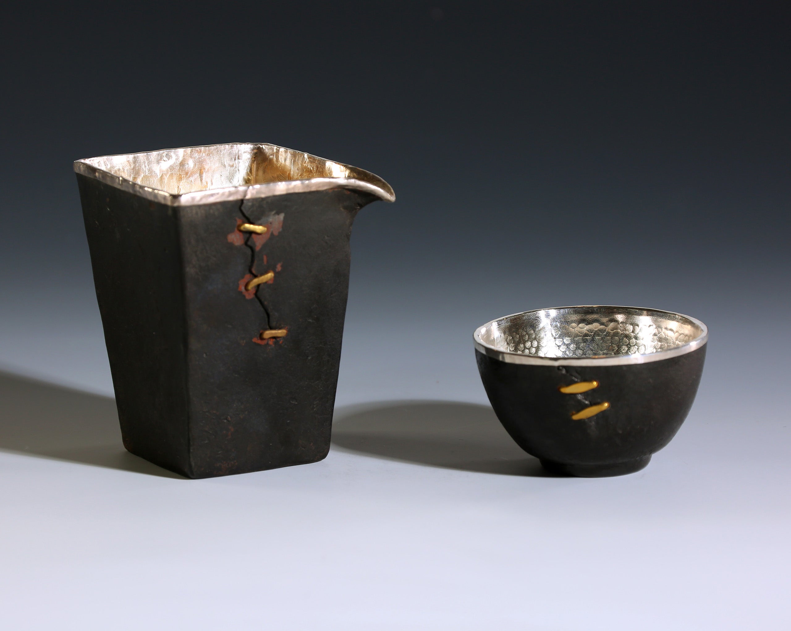 Iron-clad silver-studded fair cup