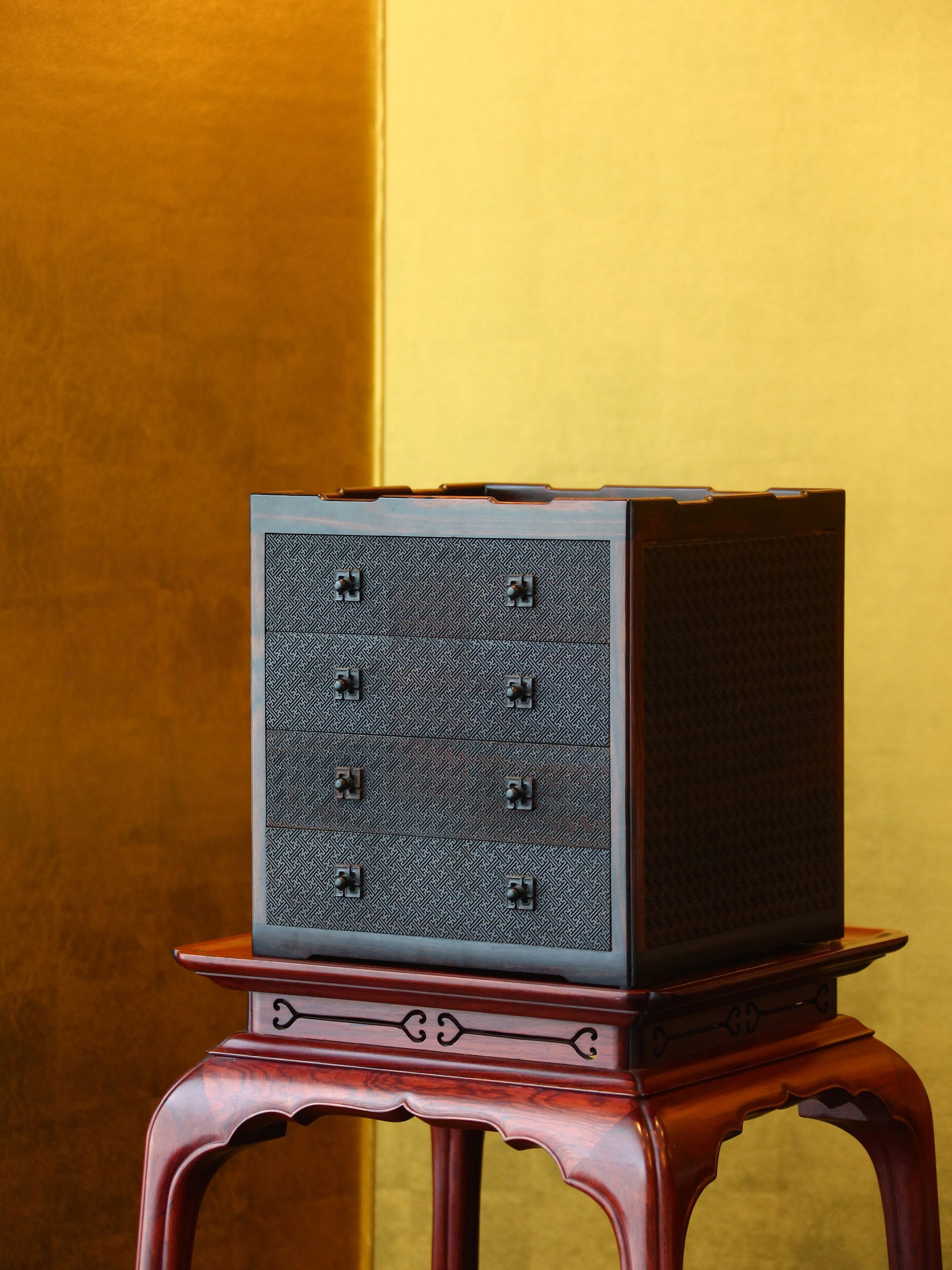 Four-drawer tea box carved with swastika pattern from rosewood.
