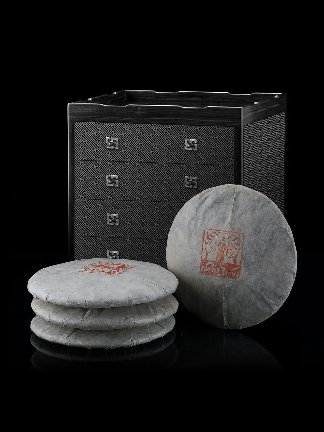 Four-drawer tea box carved with swastika pattern from rosewood.