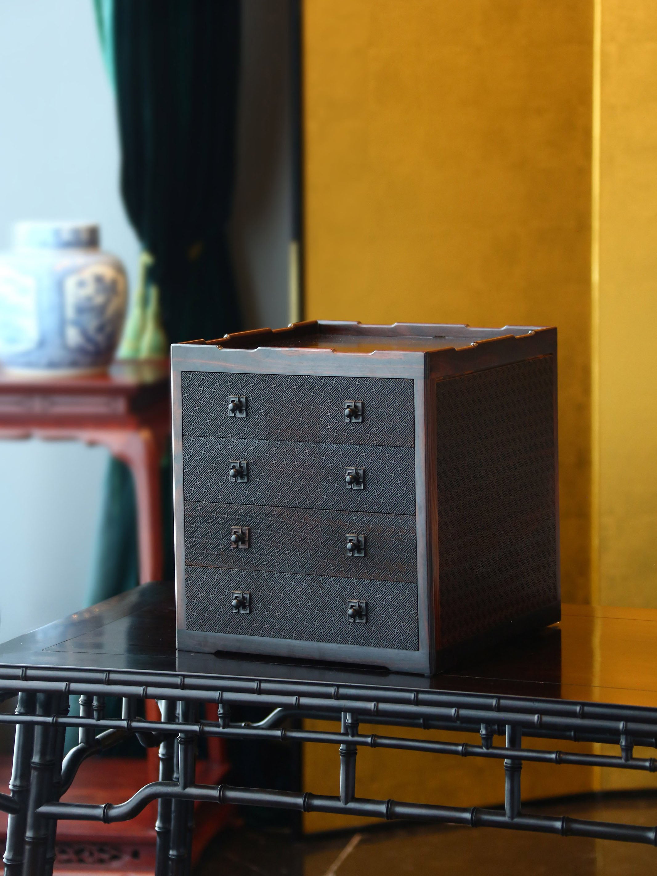 Four-drawer tea box carved with swastika pattern from rosewood.