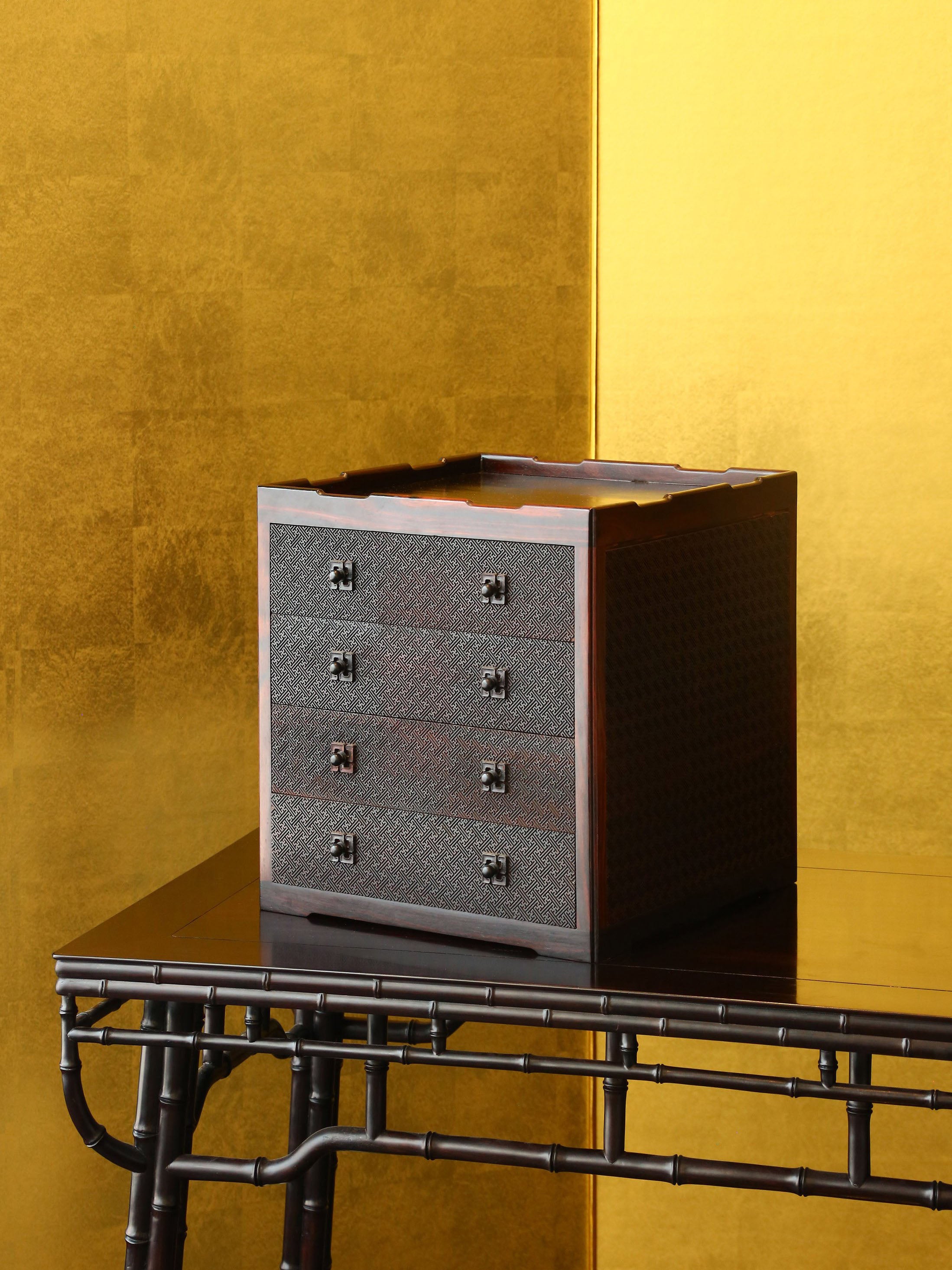 Four-drawer tea box carved with swastika pattern from rosewood.