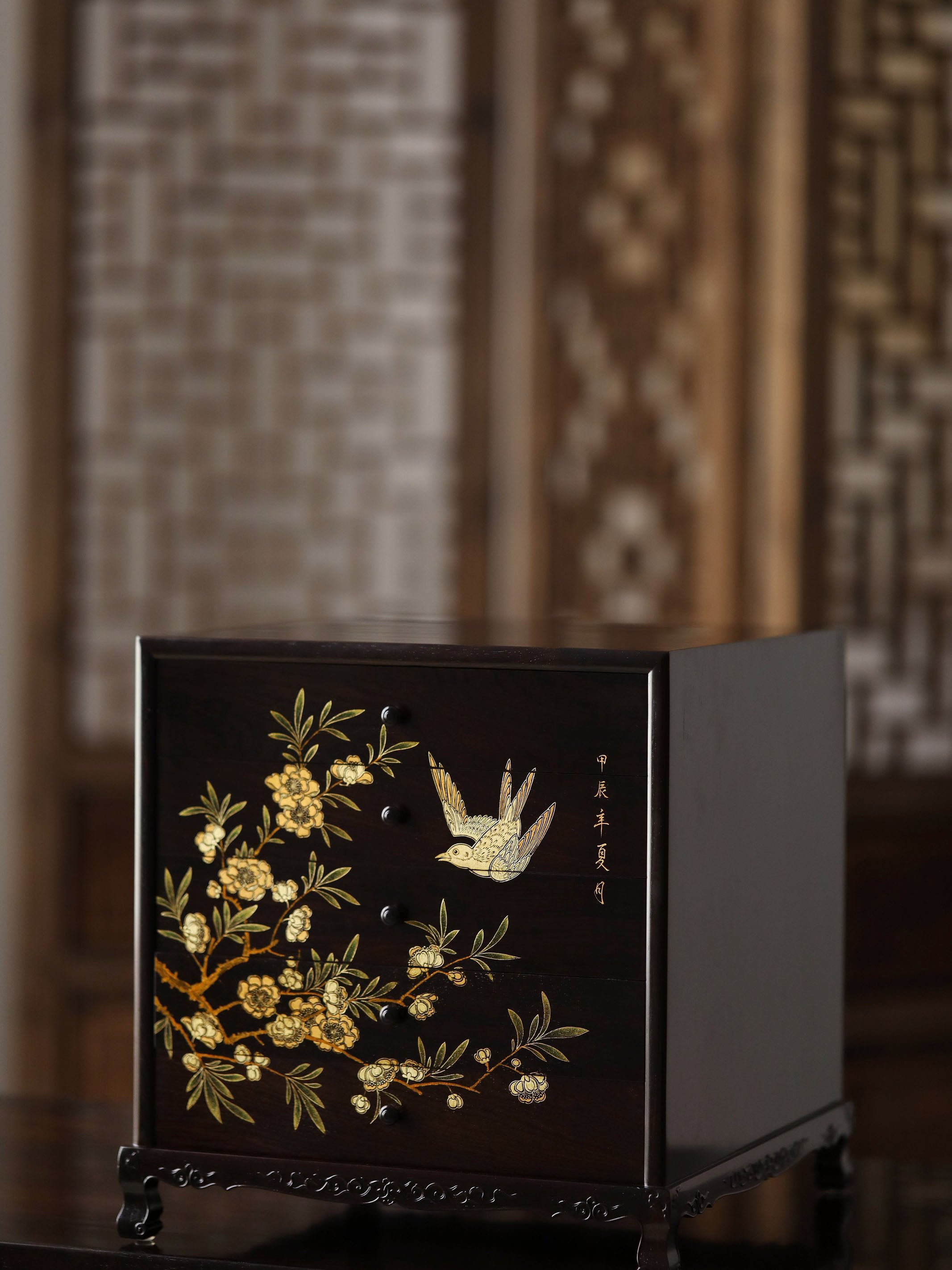 Gold piled high, joy on eyebrows / Wealth and good fortune on the table, five cups of tea on the sideboard