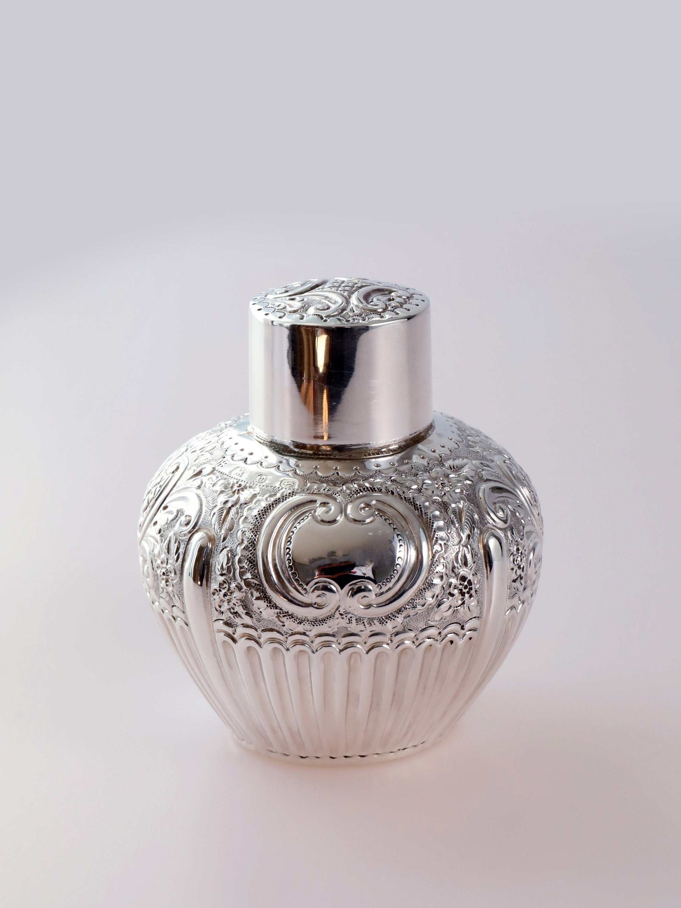 1896 British sterling silver embossed tea caddy