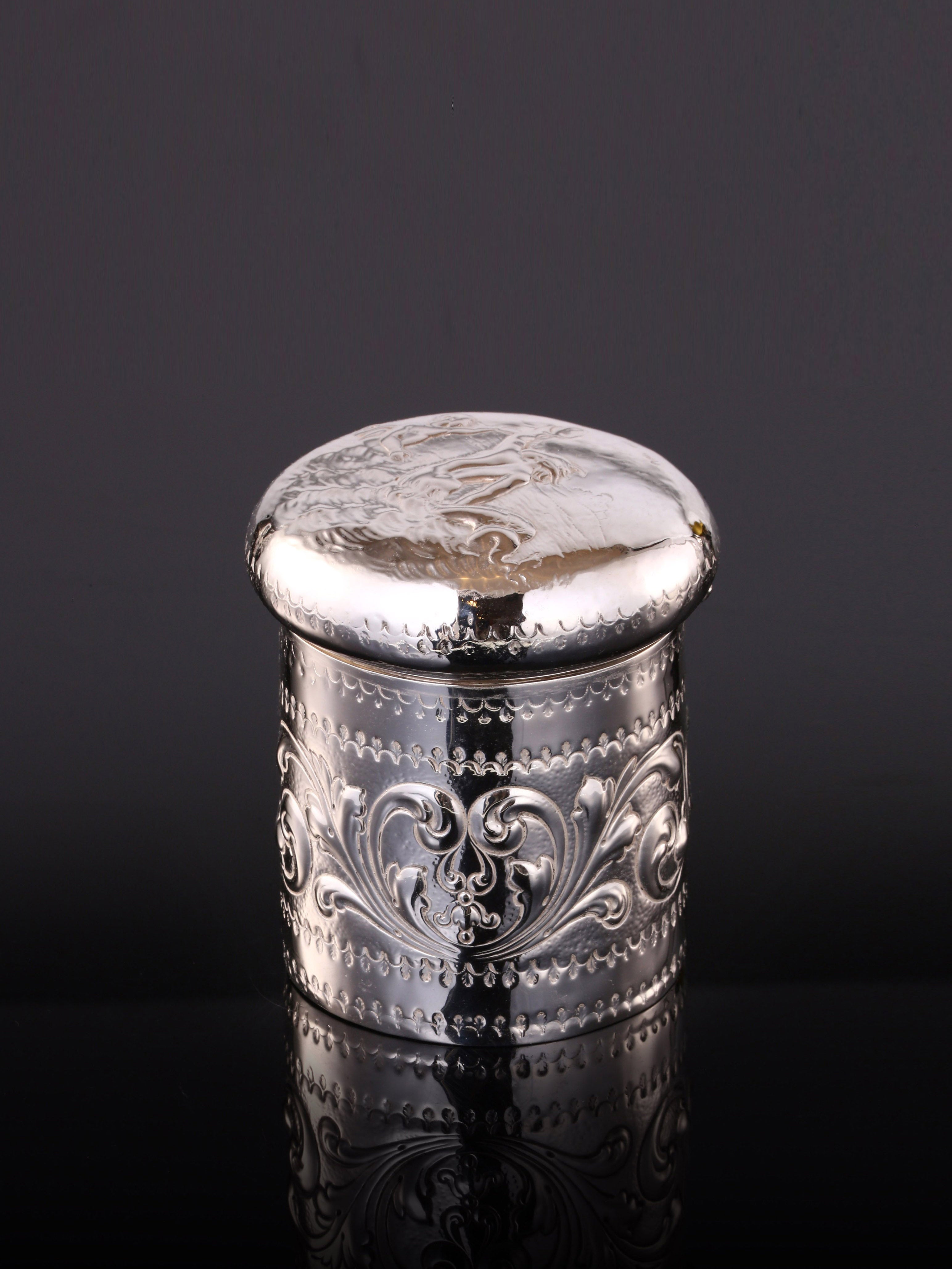 1884 British sterling silver tea caddy with relief floral and figure design