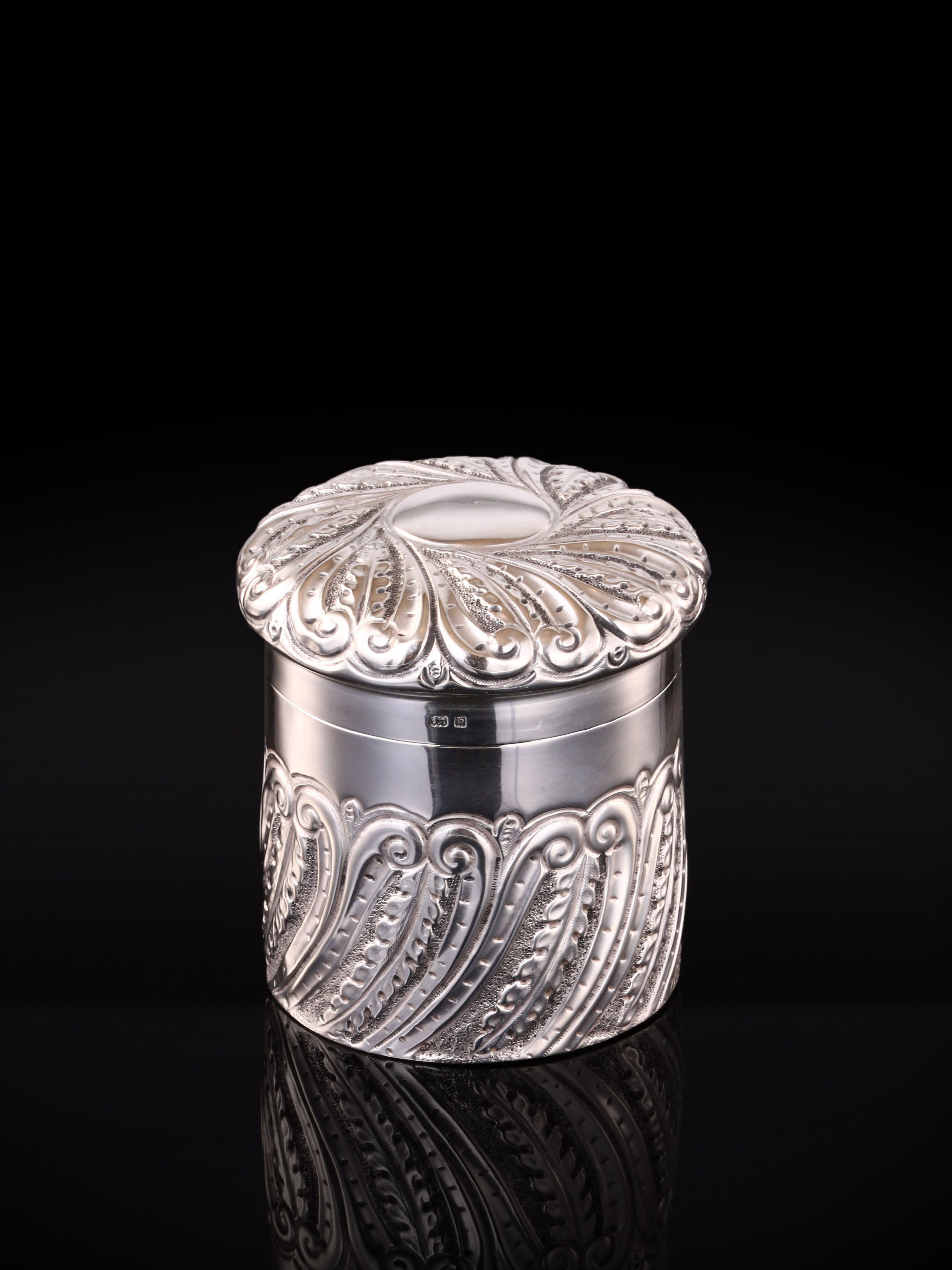 1901 British sterling silver tea caddy with scrollwork design