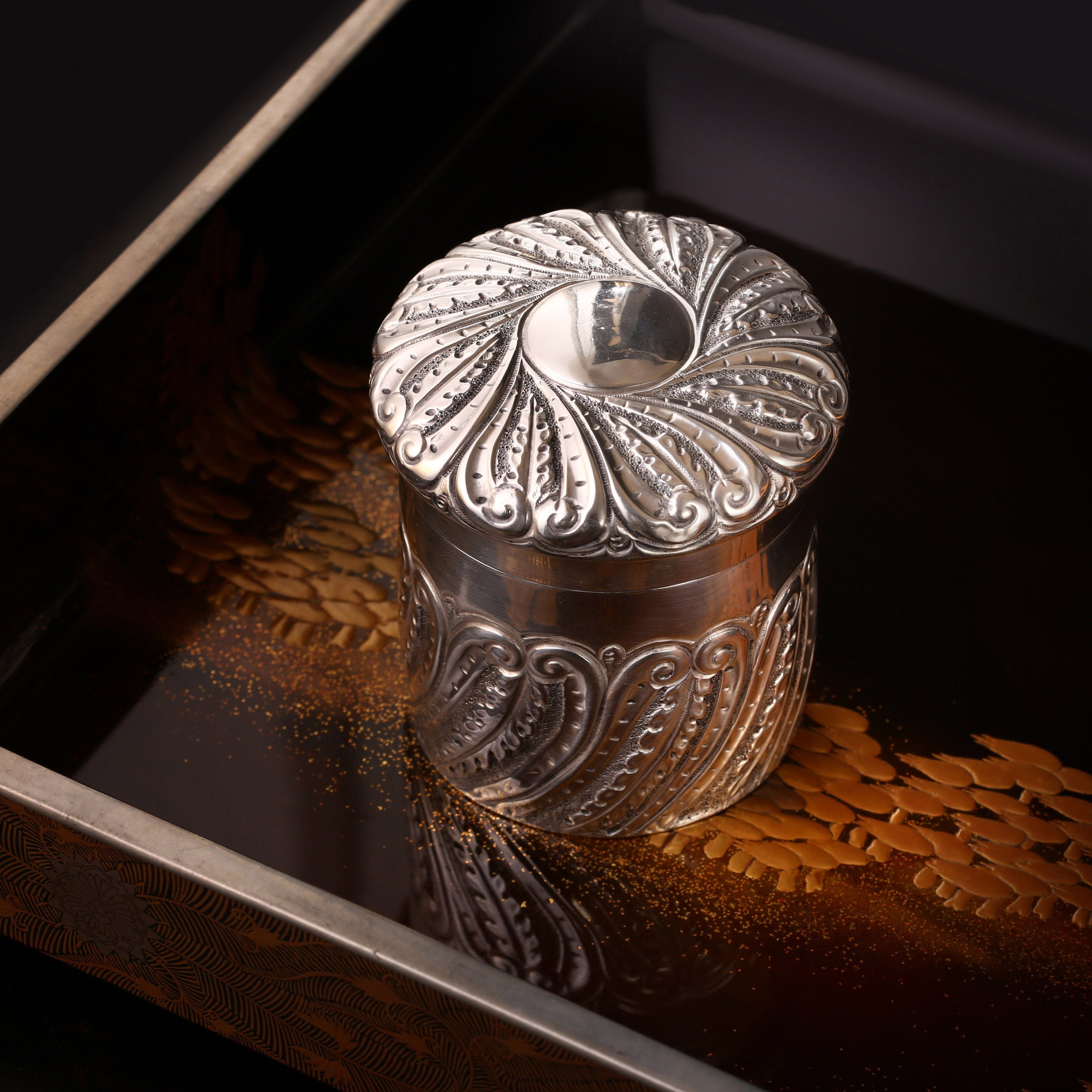 1901 British sterling silver tea caddy with scrollwork design