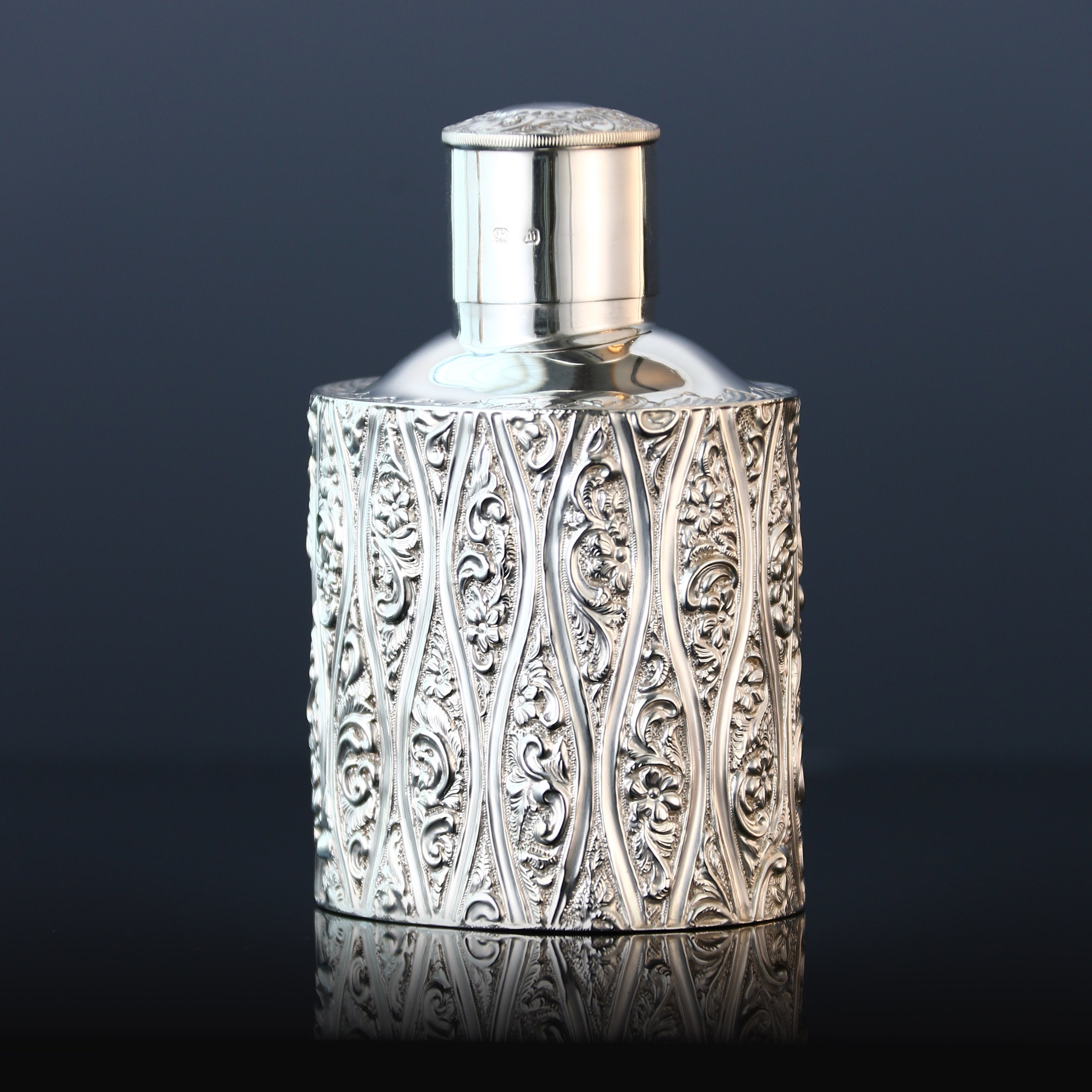 1896 British sterling silver embossed tea caddy