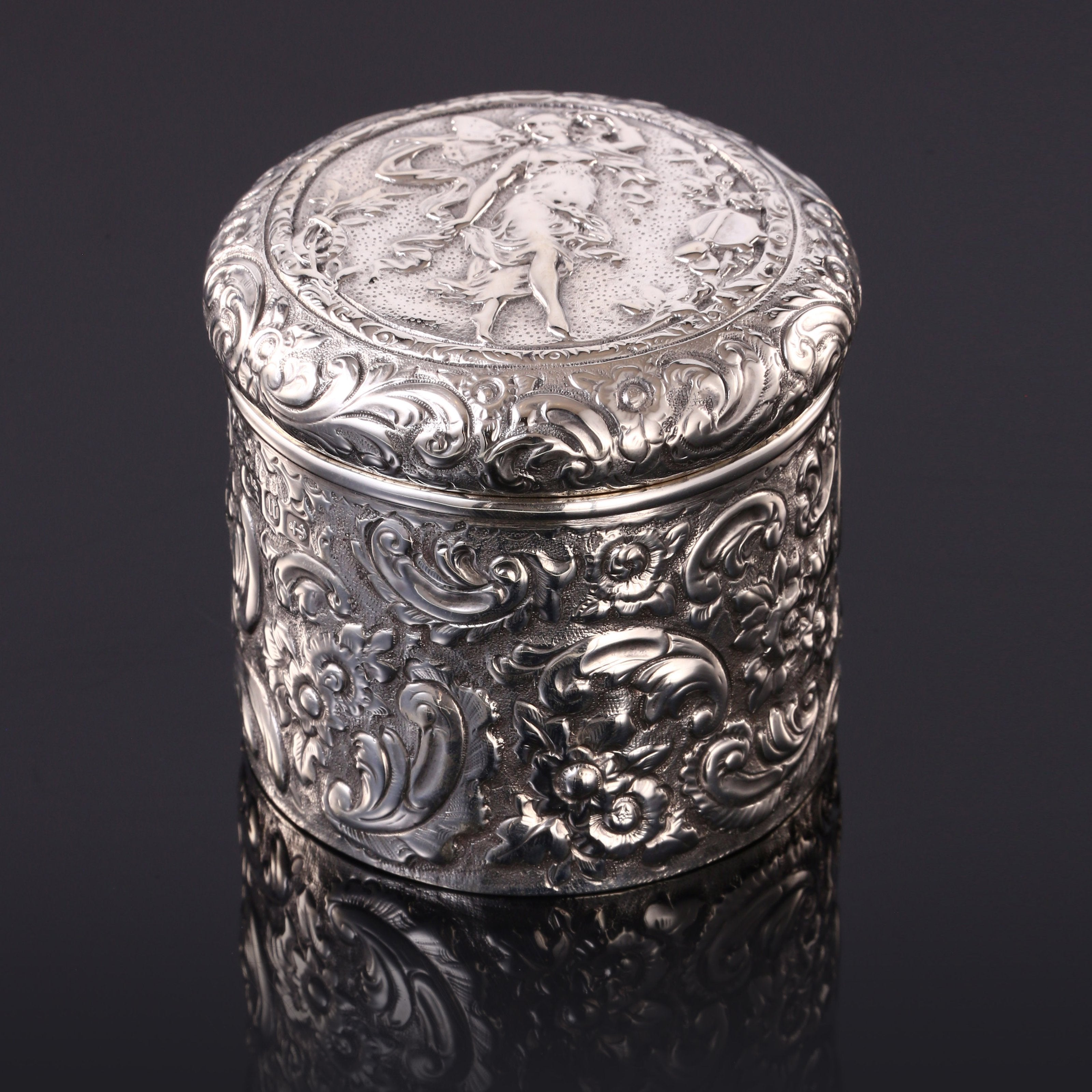 1894 British gilt-lined tea caddy with relief floral and figure design
