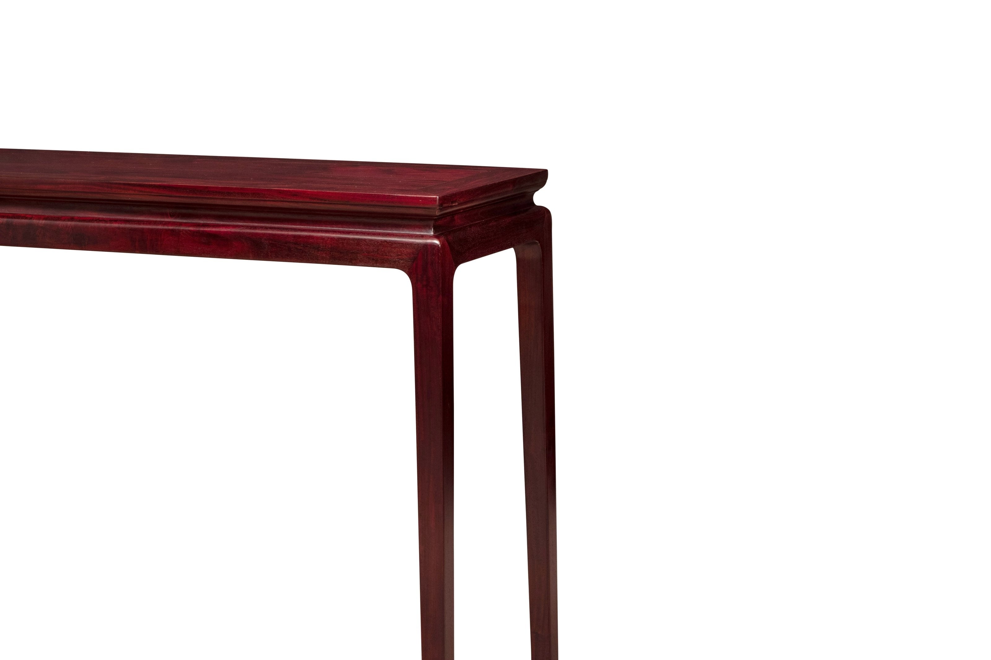 Long table with waisted legs and hoof feet